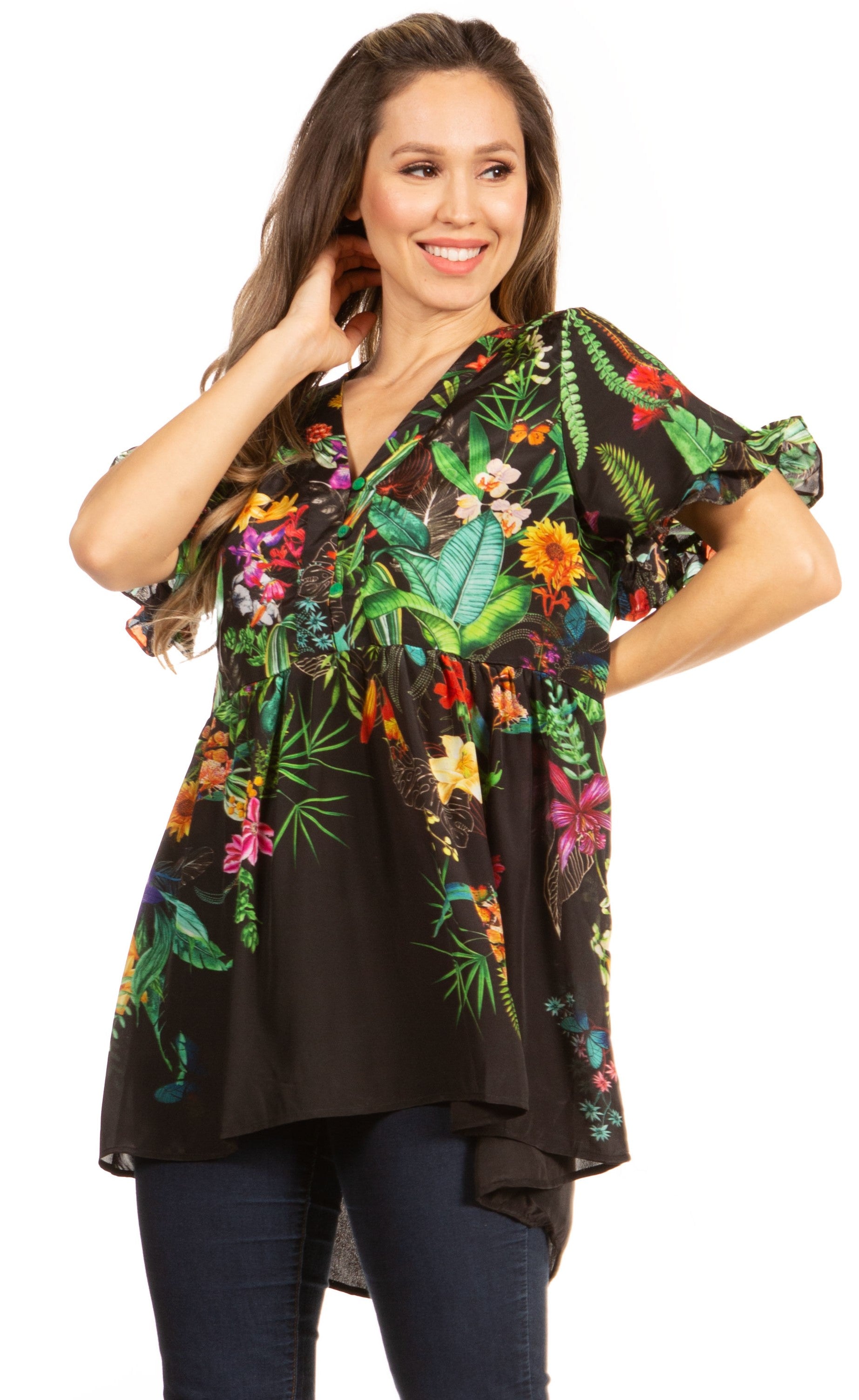 Woman wearing a black floral blouse with colorful patterns on a white background