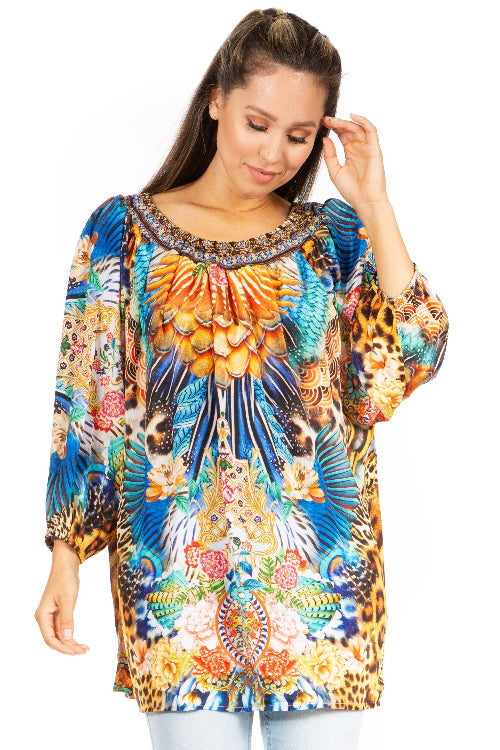 Woman wearing a colorful patterned dress on a white background