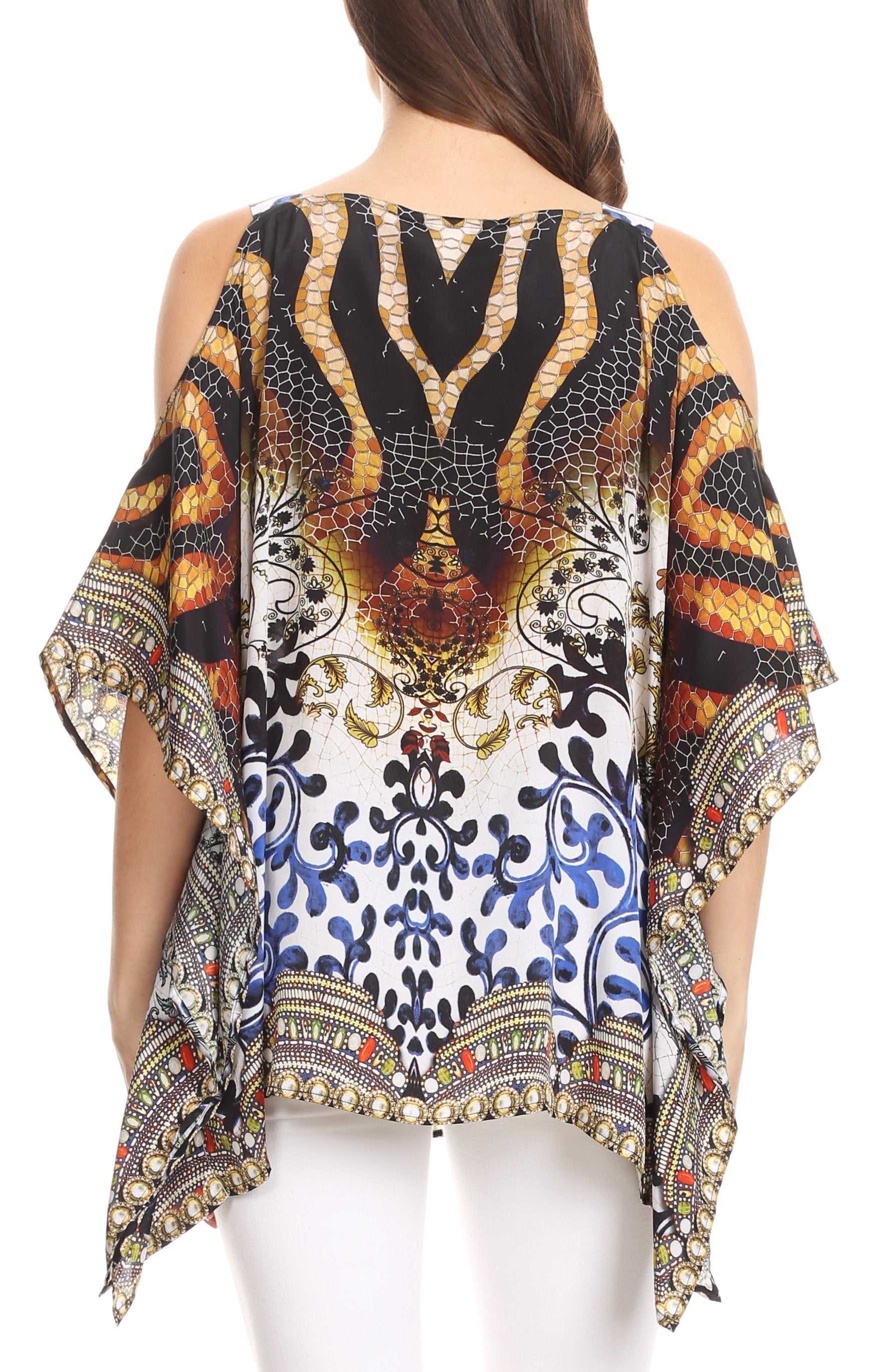 Woman wearing a colorful patterned top with a white background