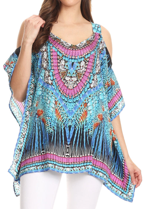 Colorful patterned top worn by a model on a white background