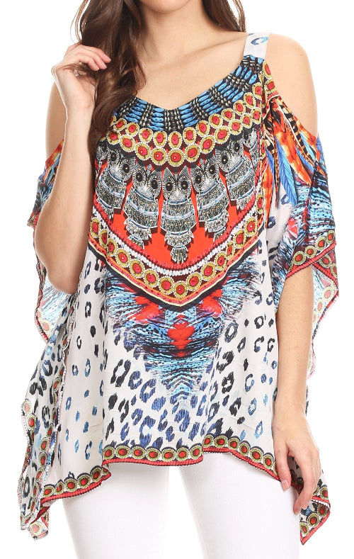 Colorful patterned top worn by a model on a white background