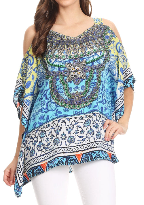 Woman wearing a colorful patterned top on a white background