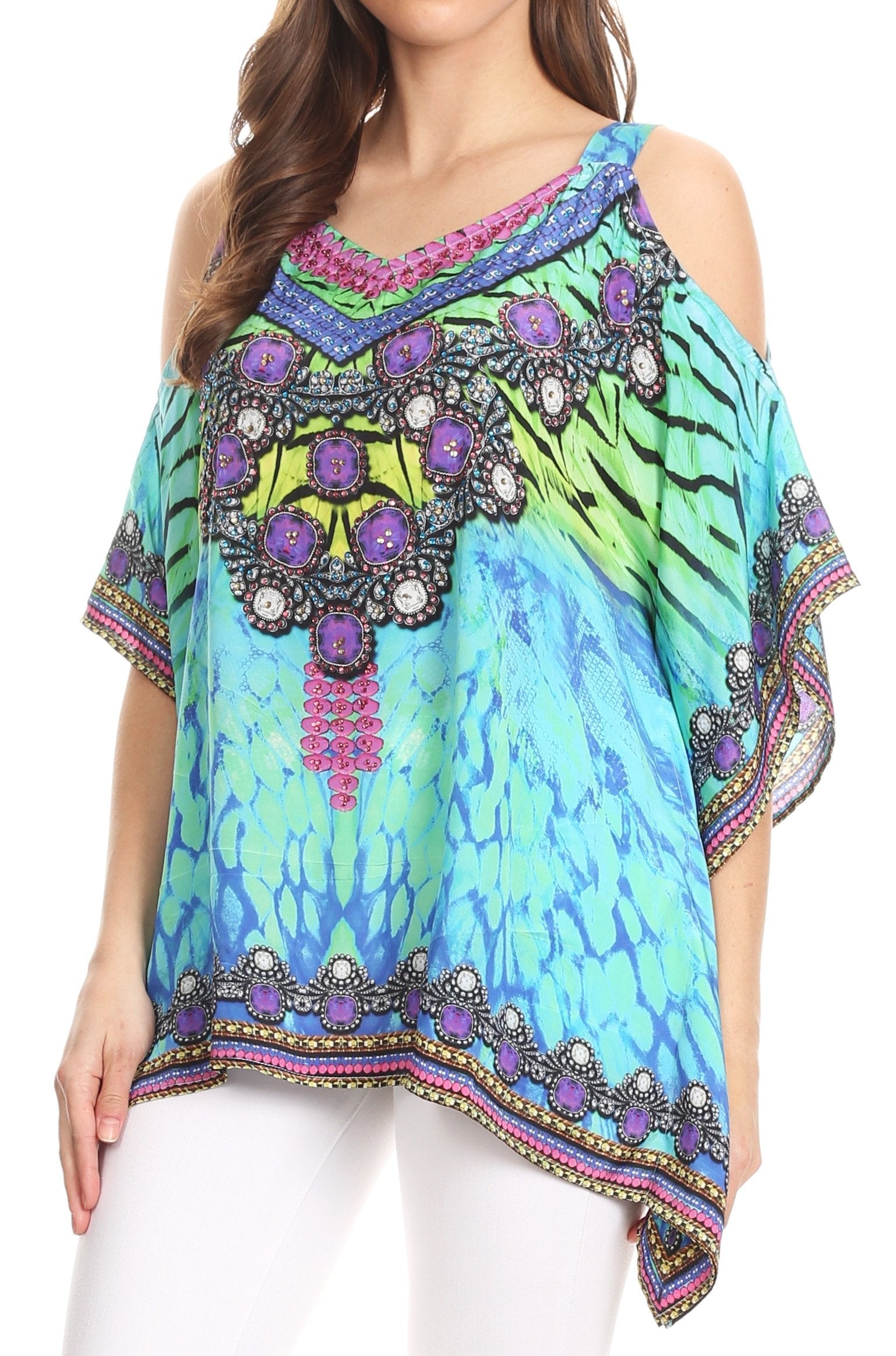 Multicolored patterned top with embellishments on a white background