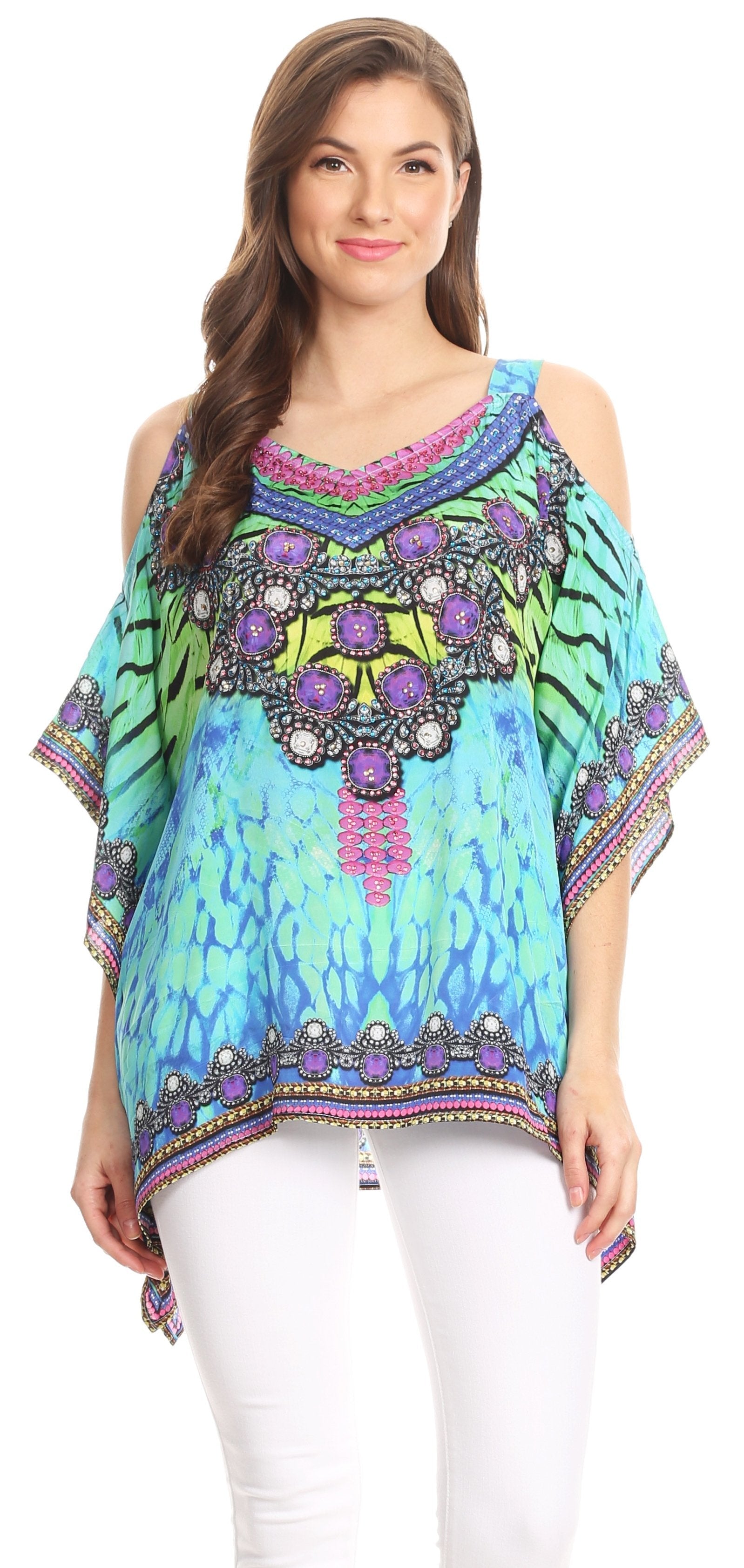 Woman wearing a colorful, patterned top with a white background
