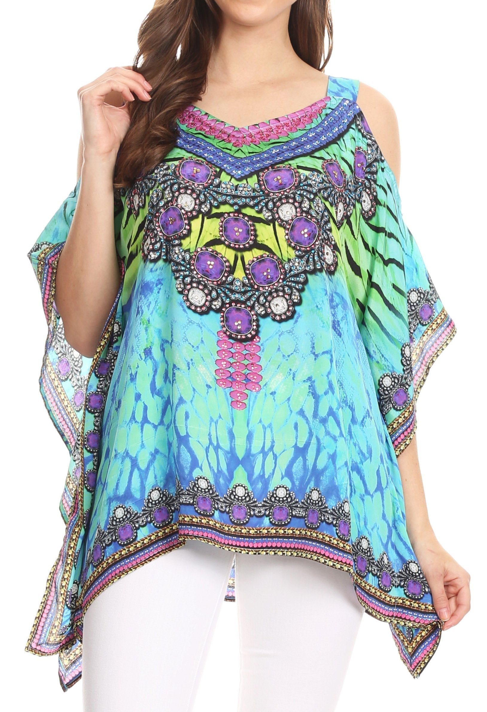 Woman wearing a colorful, patterned top with a white background