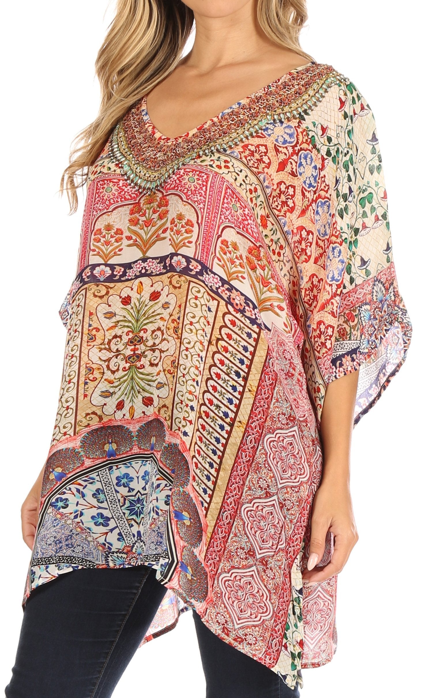 Colorful patterned top worn by a model on a white background
