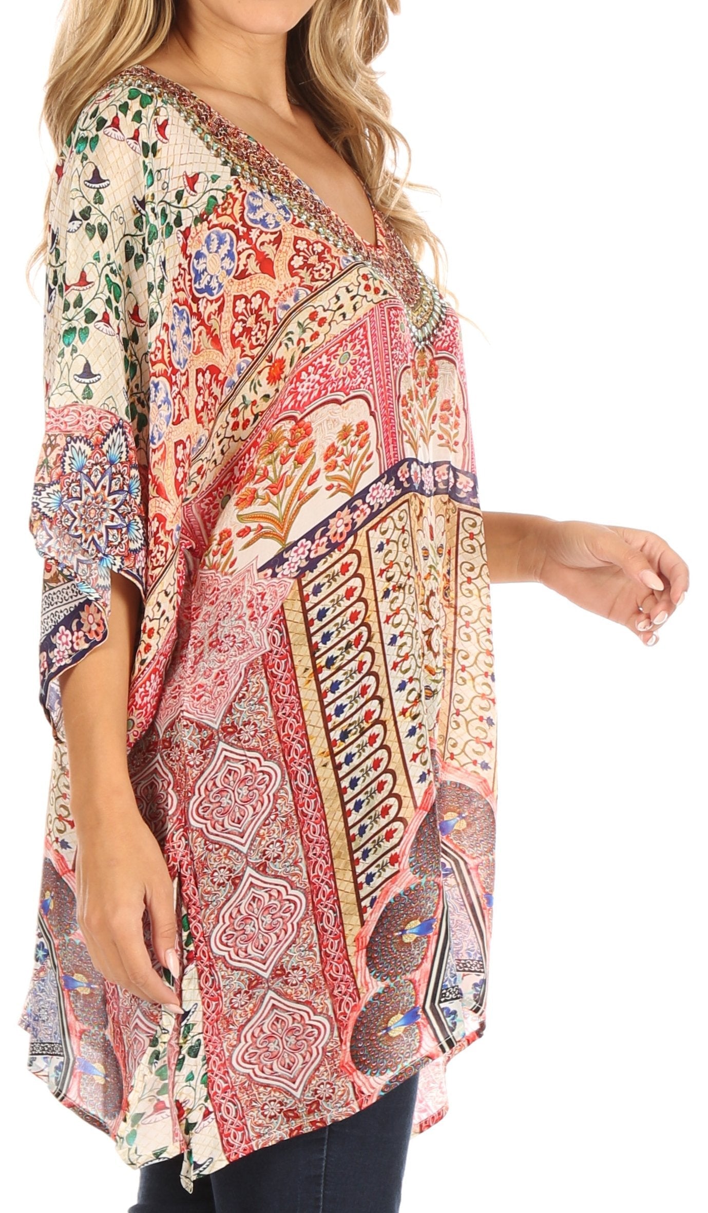 Colorful patterned top worn by a model on a white background
