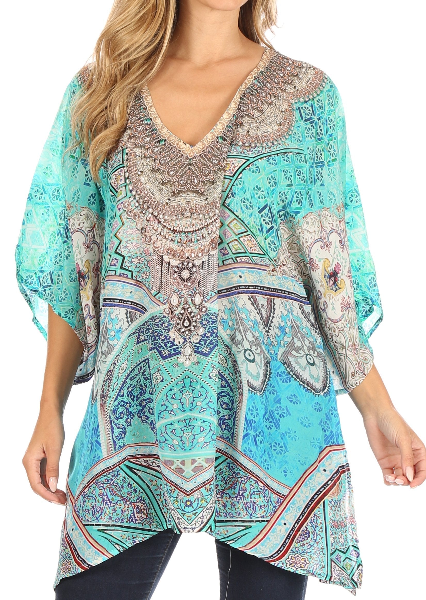 Woman wearing a colorful patterned top with a white background
