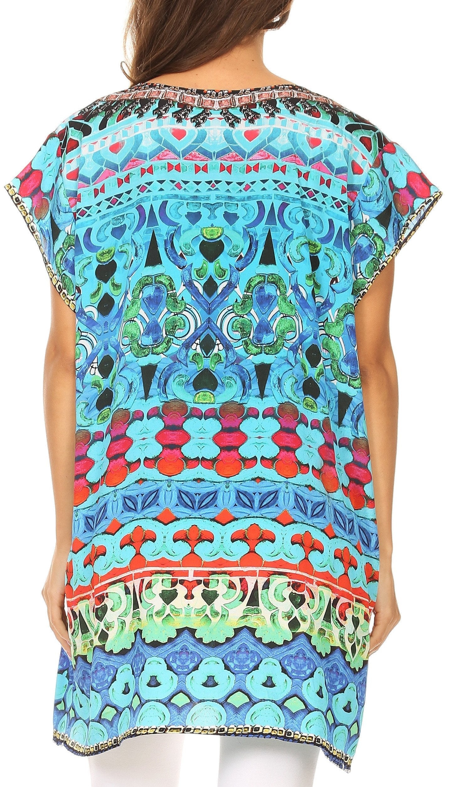 Colorful patterned top worn by a person, with a focus on the design.