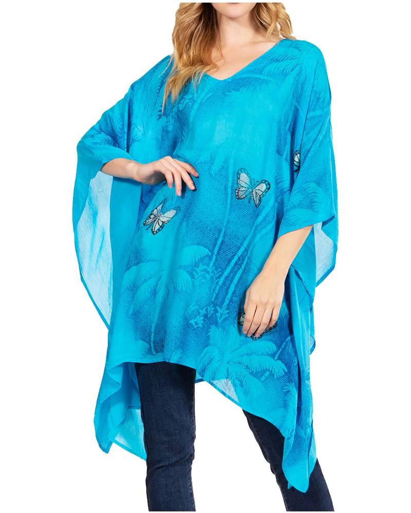 Woman wearing a blue sheer top with butterfly designs on a white background