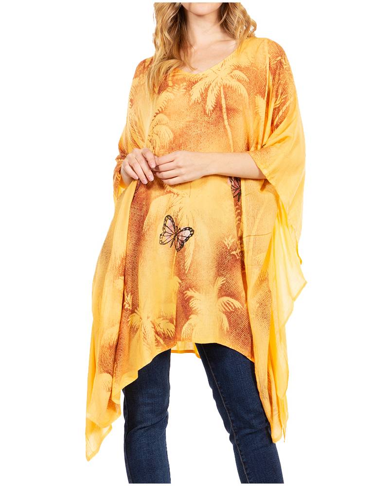 Woman wearing a yellow butterfly-patterned top on a white background
