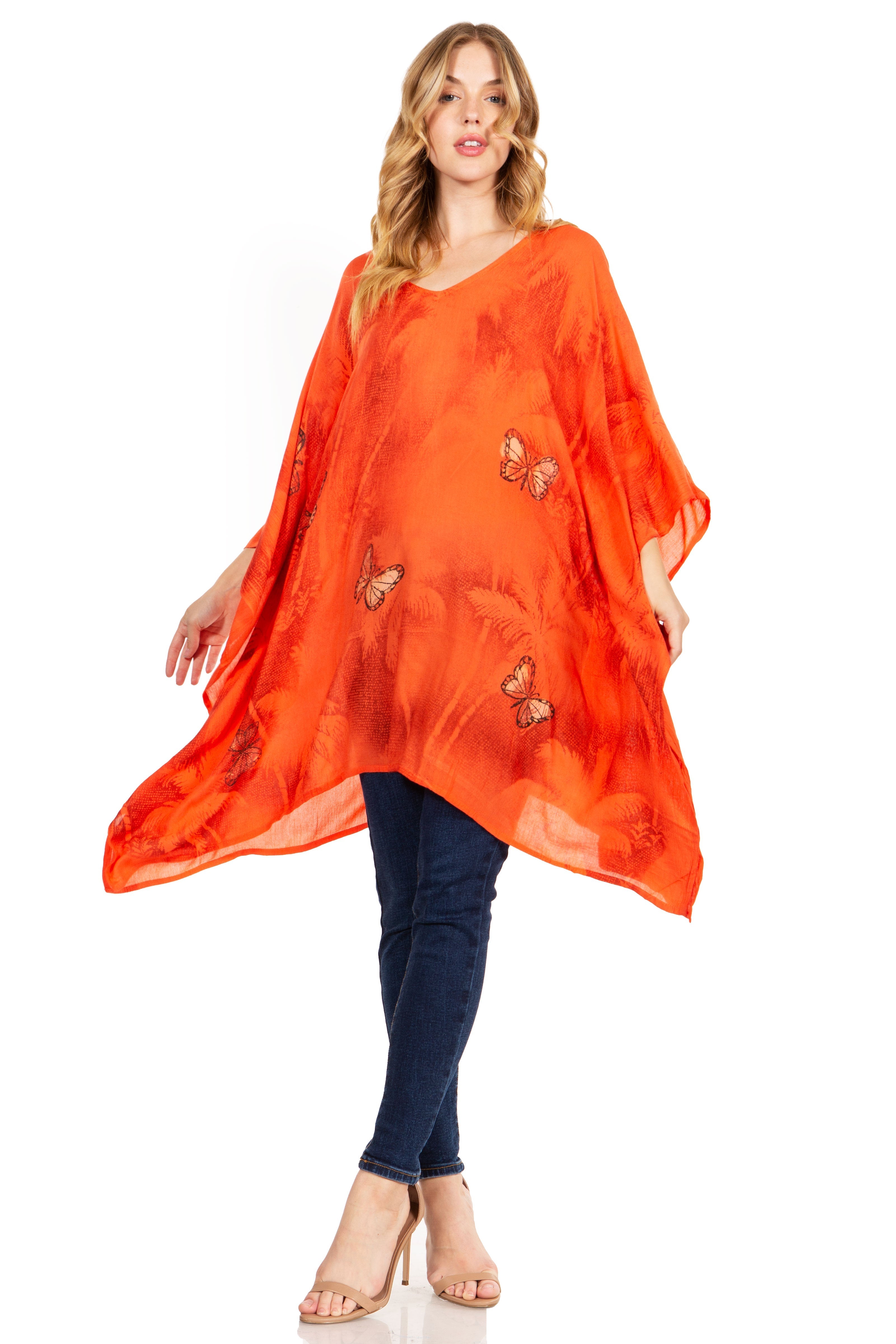 Woman wearing an orange butterfly-patterned dress on a white background