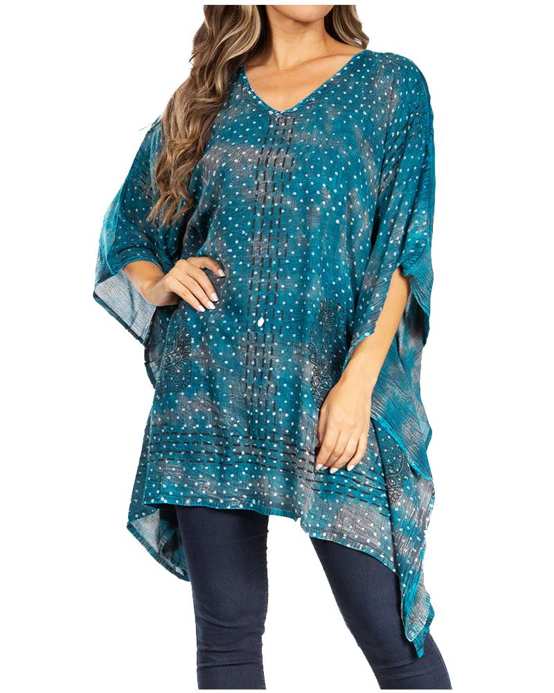 Teal patterned top worn by a model on a white background