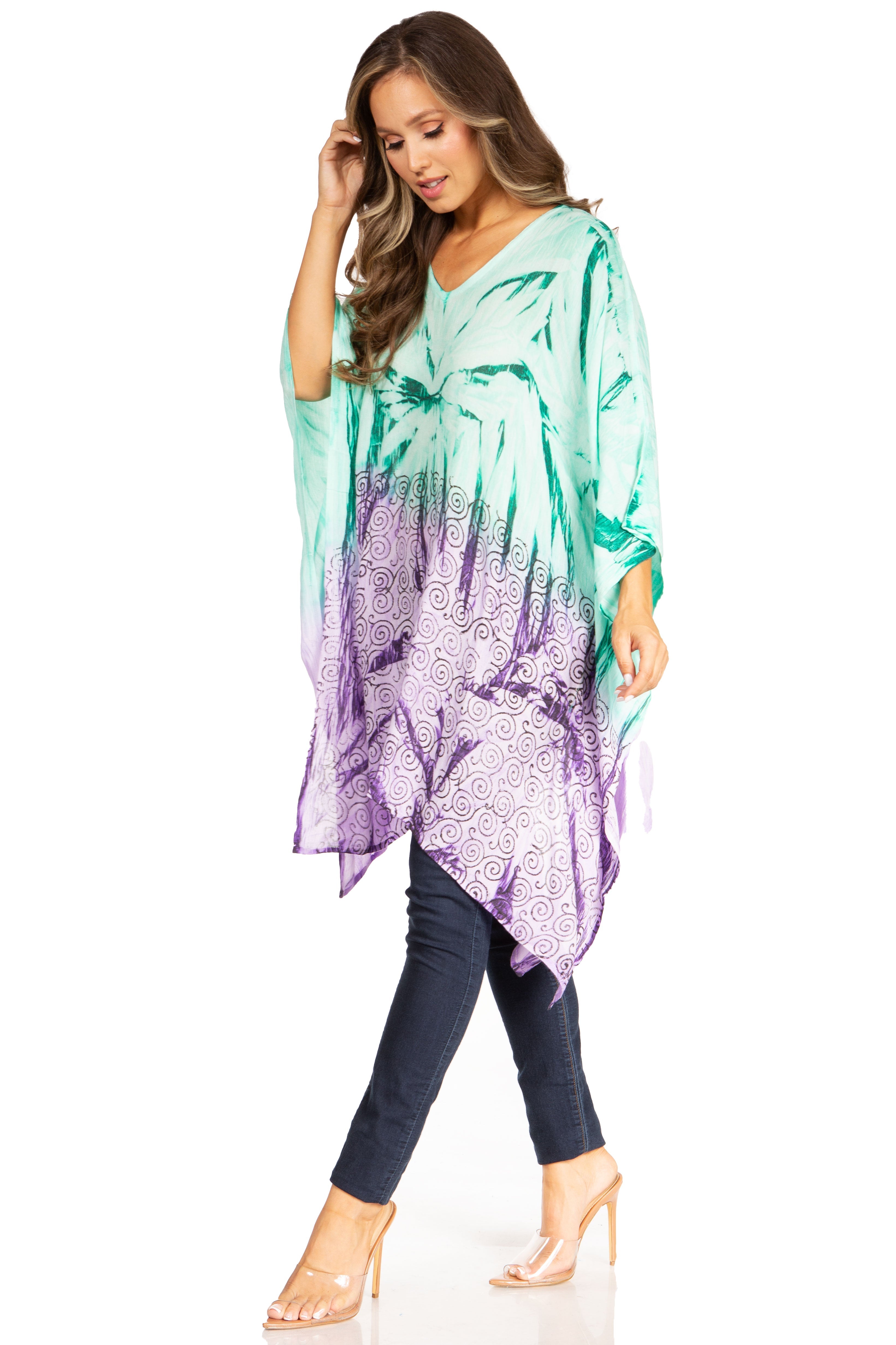 Woman wearing a colorful kimono-style garment with a white background