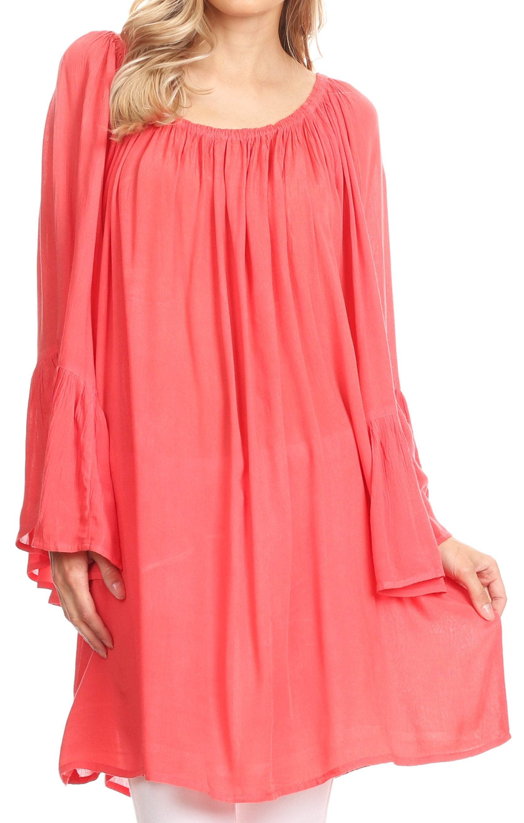 Coral dress with long sleeves on a white background