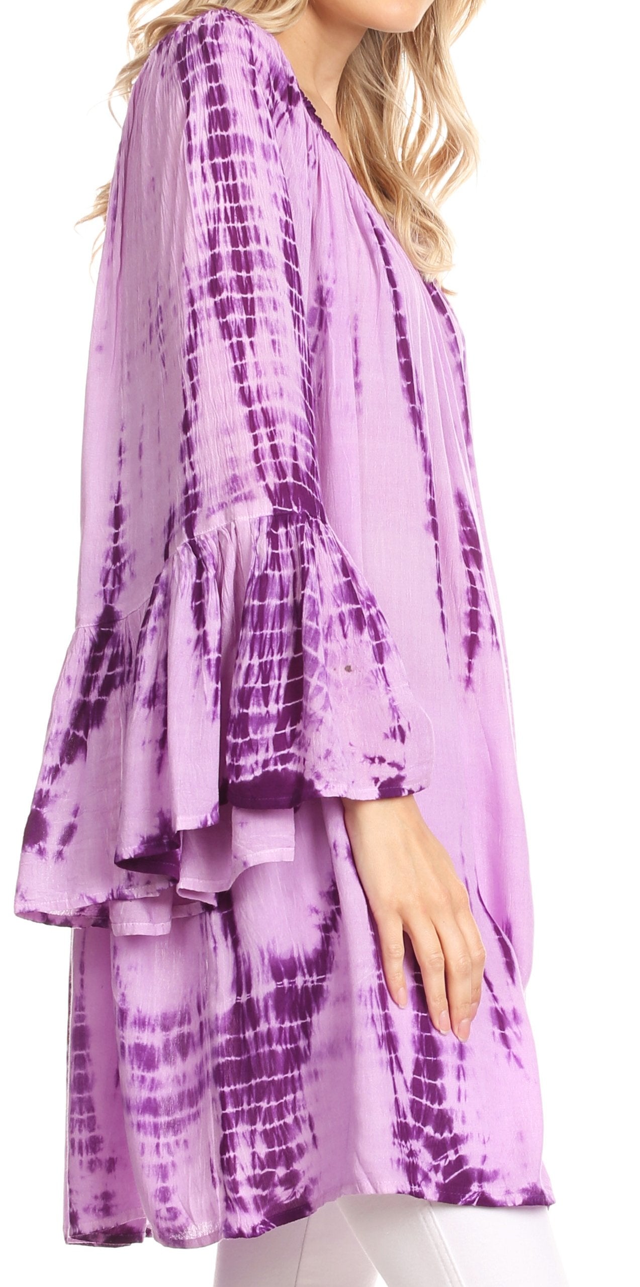 Purple tie-dye dress worn by a model on a white background