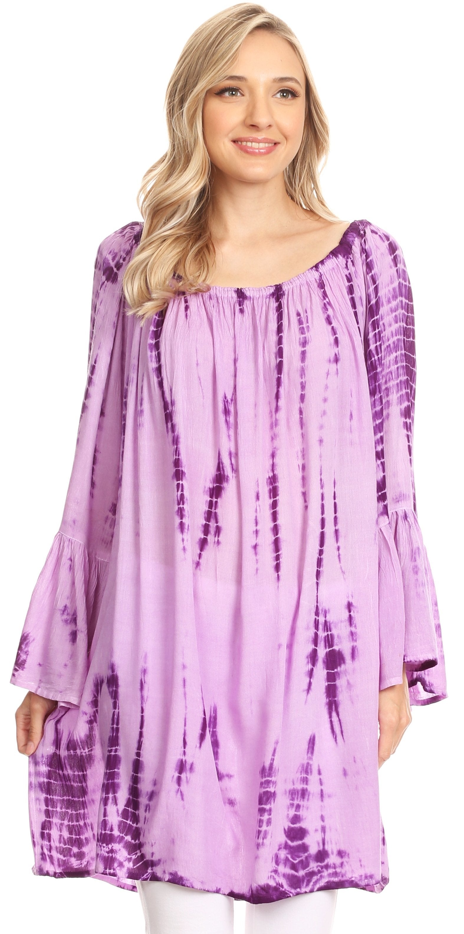 Woman wearing a purple tie-dye dress on a white background
