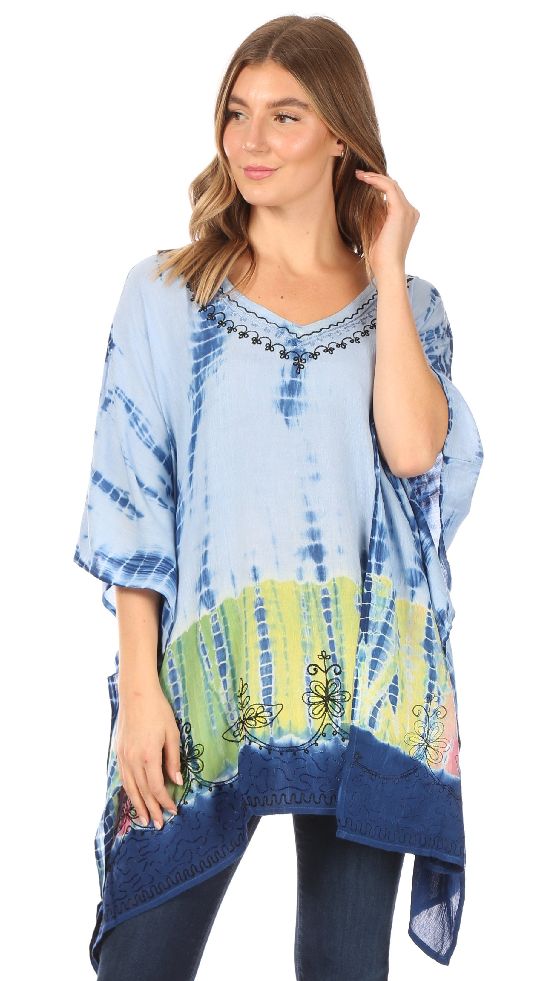 Woman wearing a blue tie-dye shirt with colorful patterns on a white background
