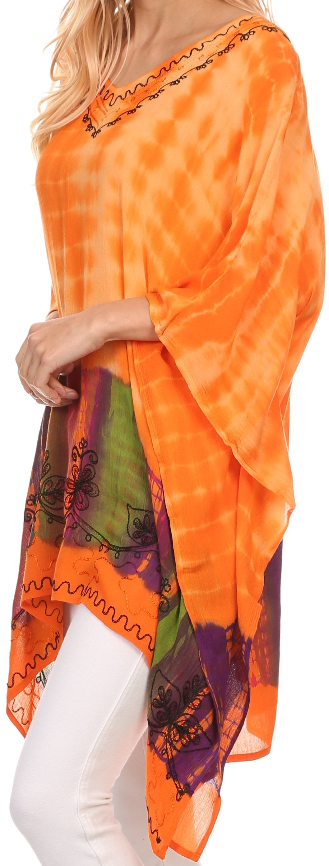 Orange tie-dye shirt with colorful patterns on a plain background