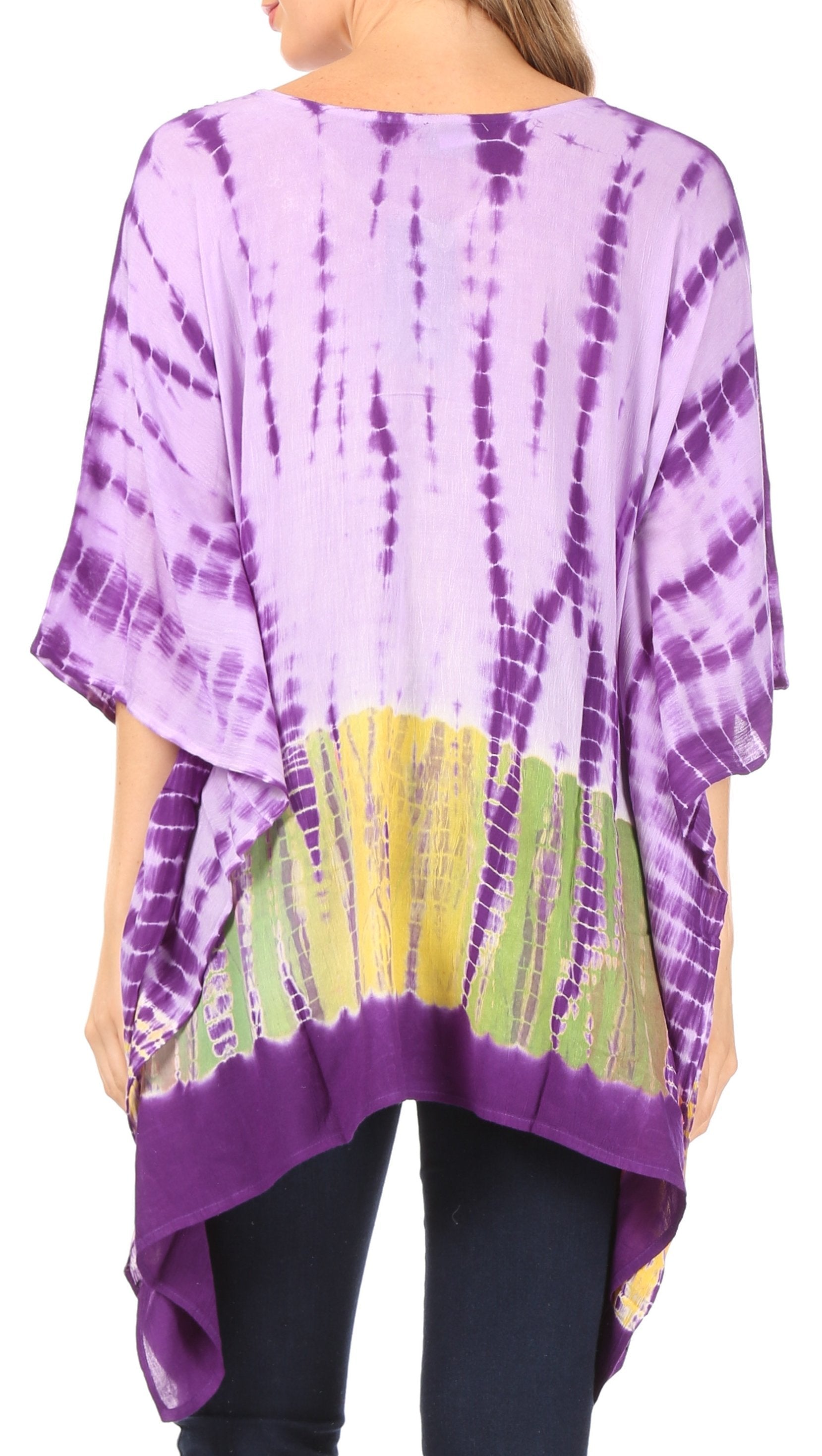 Purple and yellow tie-dye top worn by a person on a white background