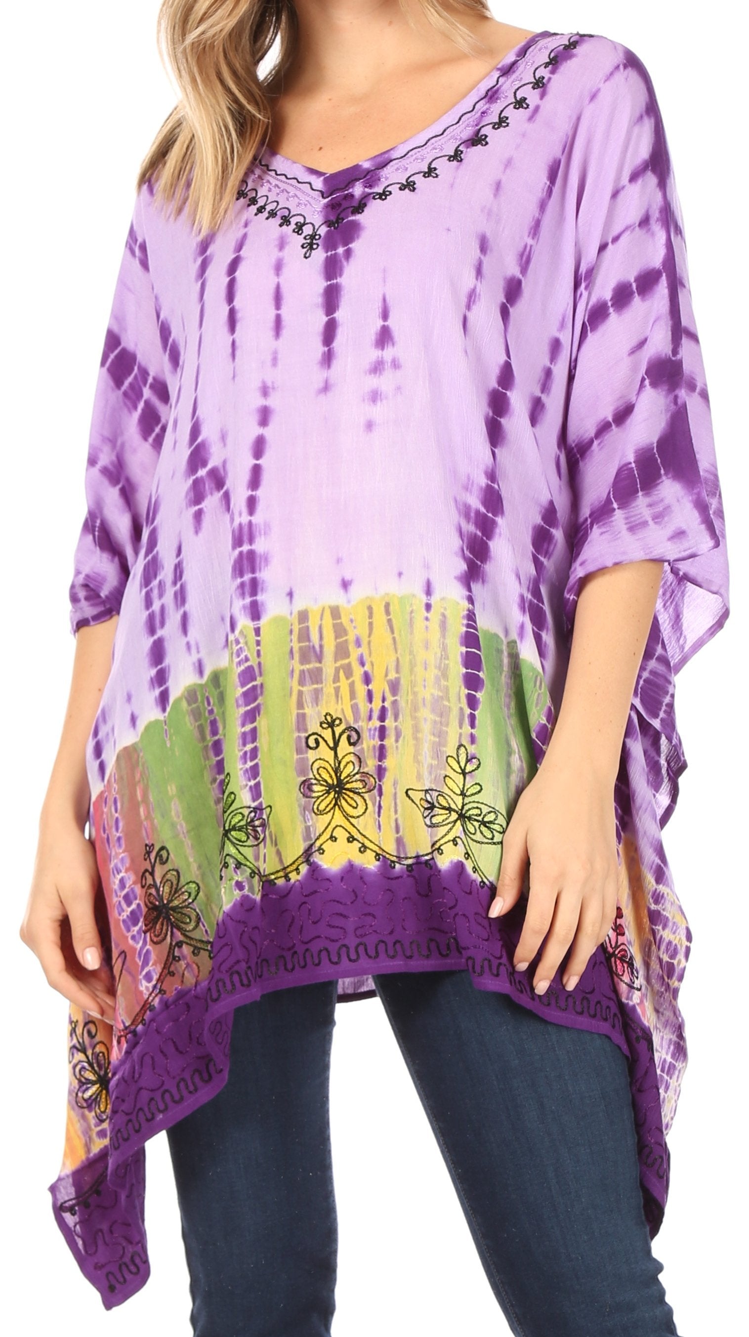 Purple tie-dye shirt with colorful patterns worn by a person on a white background
