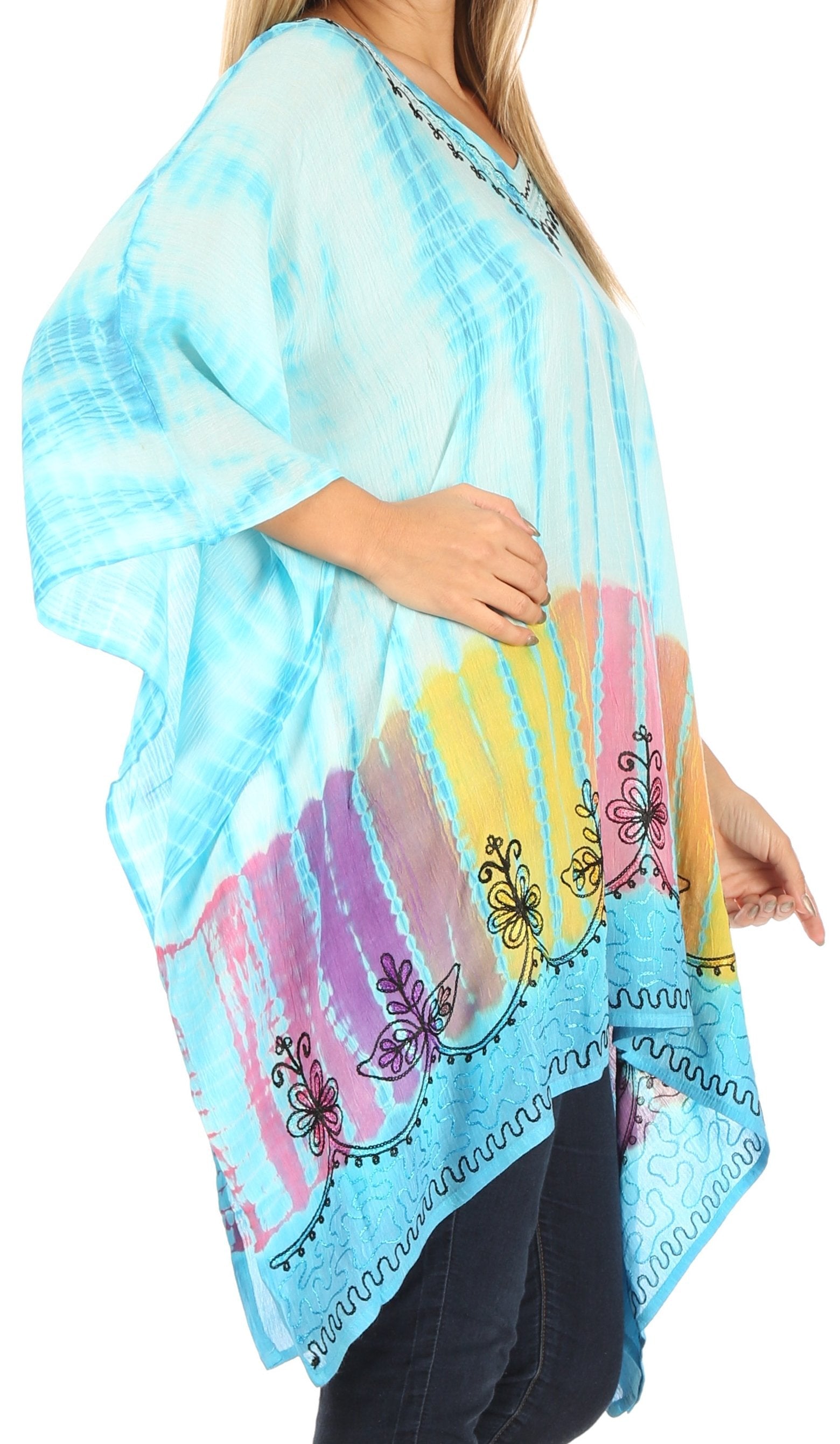 Woman wearing a colorful kimono-style garment with butterfly designs on a white background