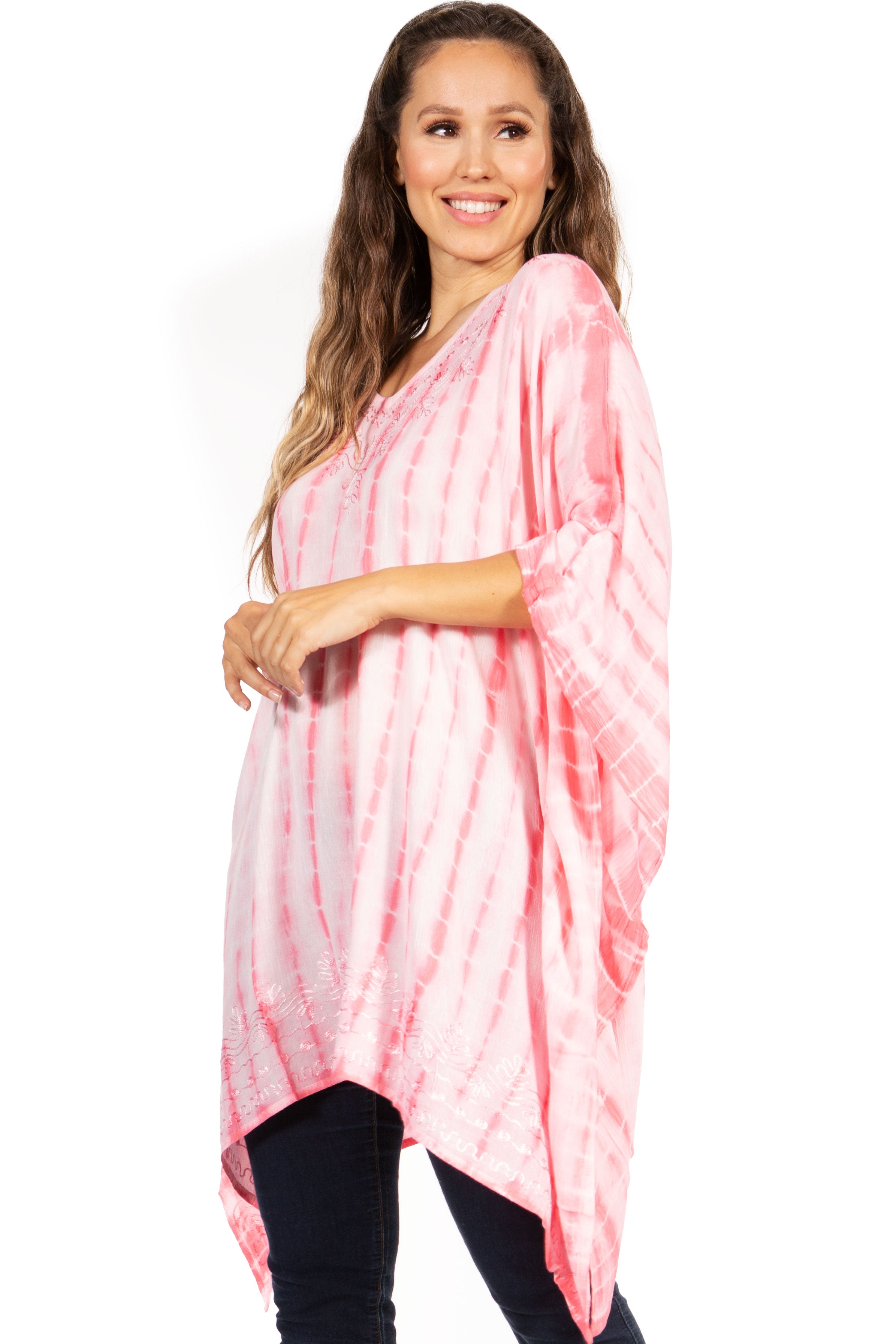 Woman wearing a pink tie-dye dress on a white background