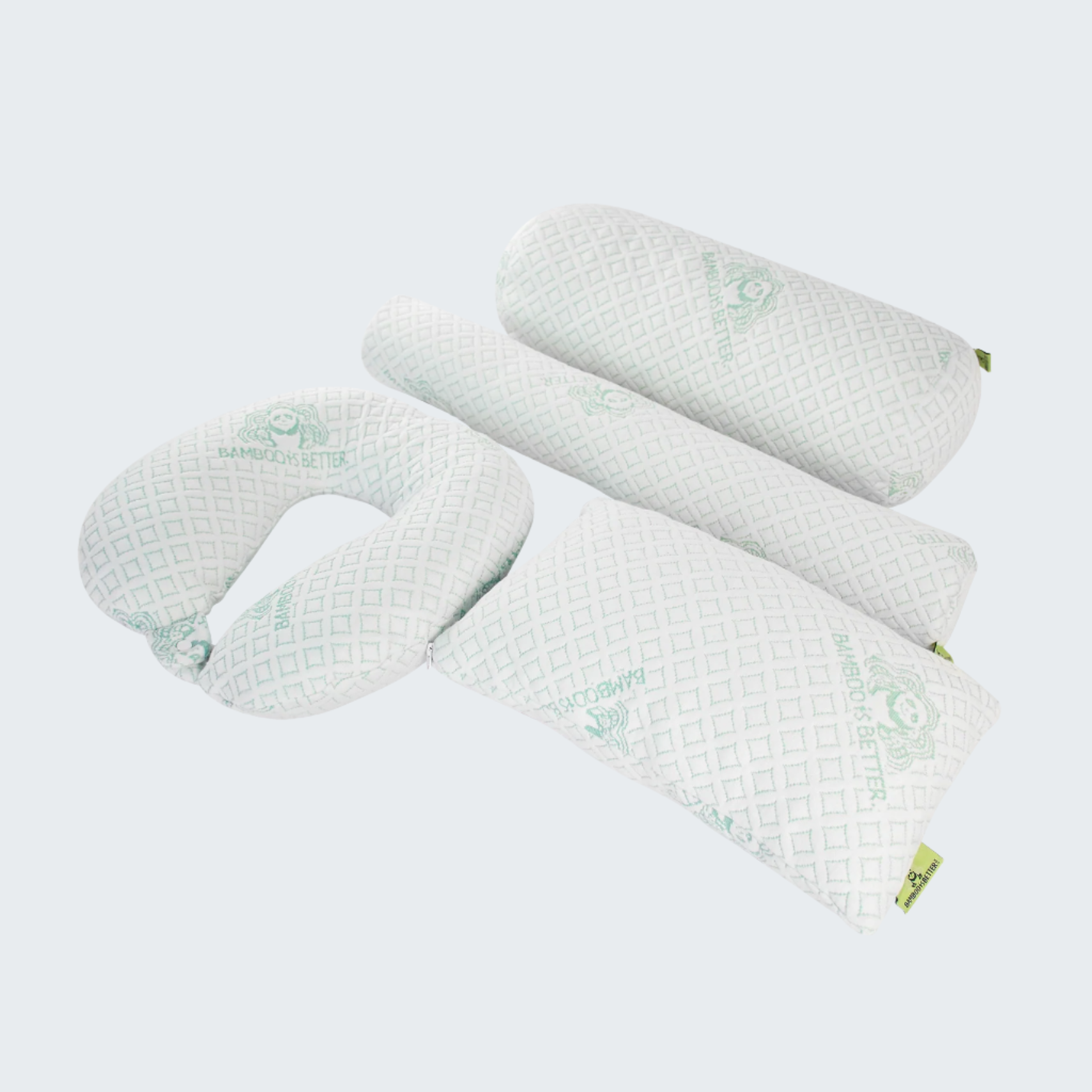 Set of white pillows with green branding on a white background