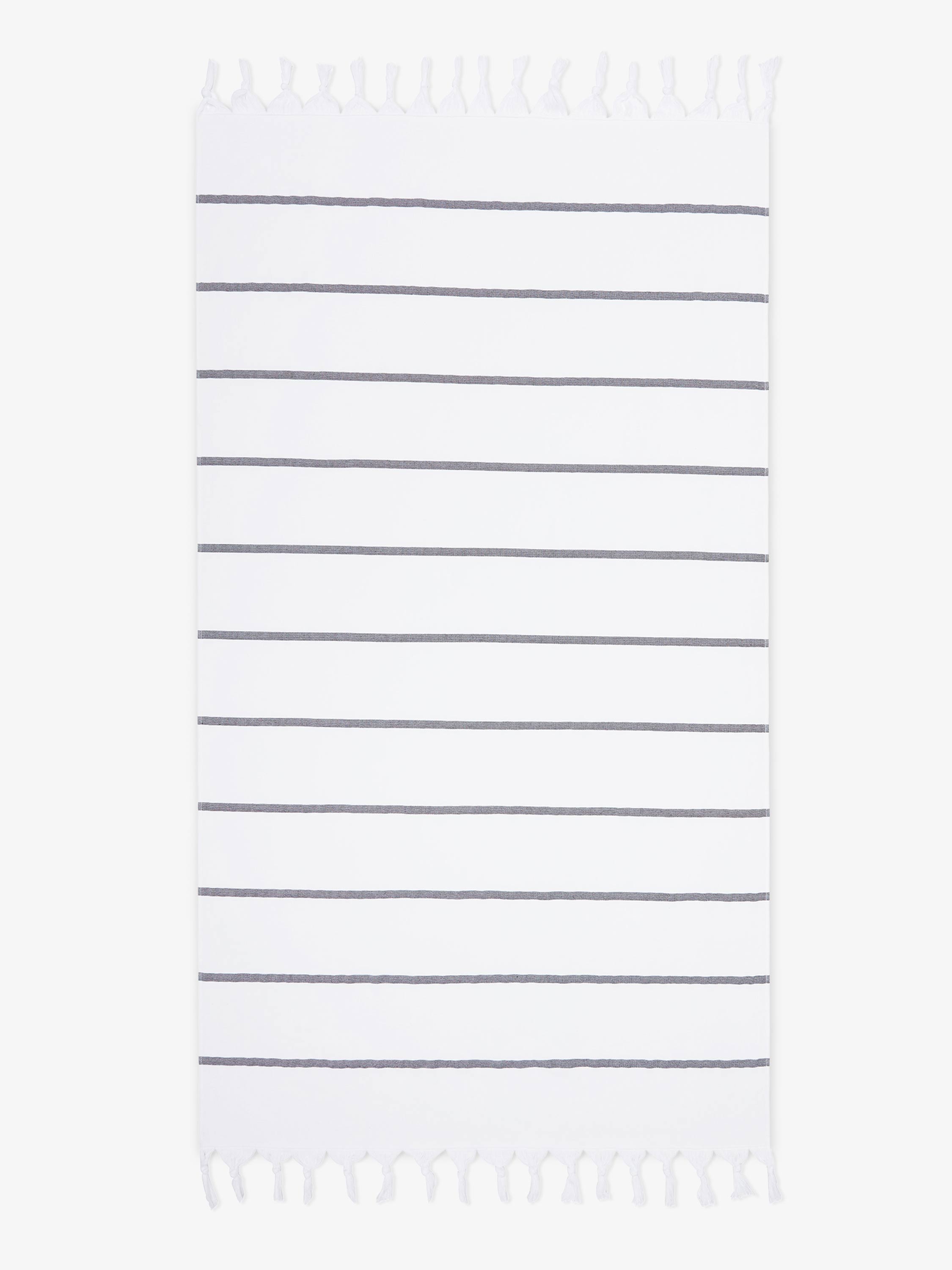 White towel with black stripes on a white background