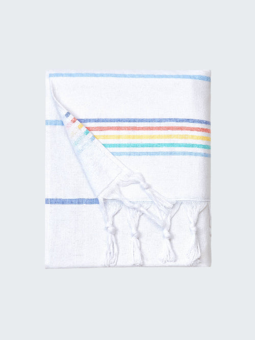 Folded towel with rainbow stripes on a white background