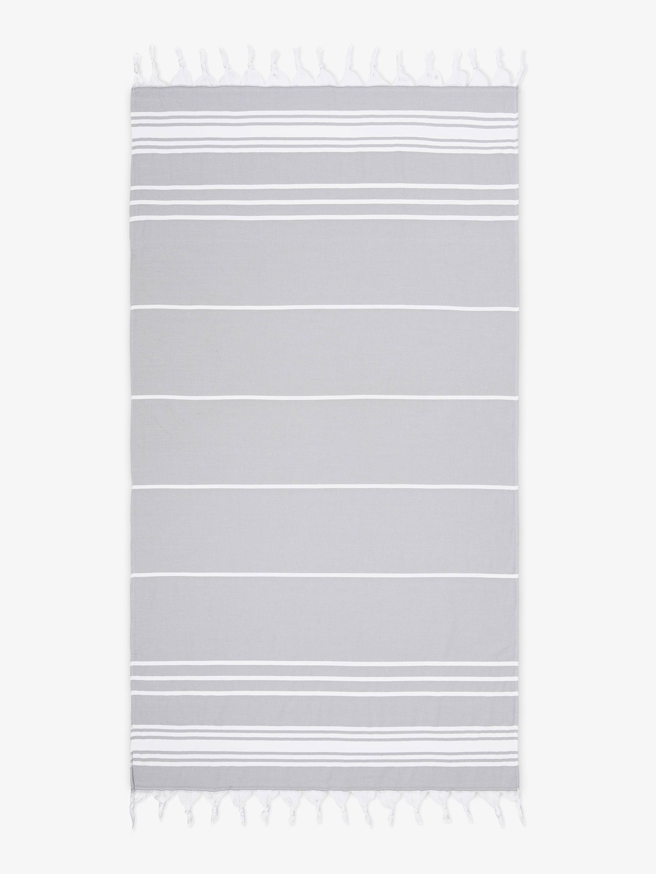 Gray towel with white stripes on a white background