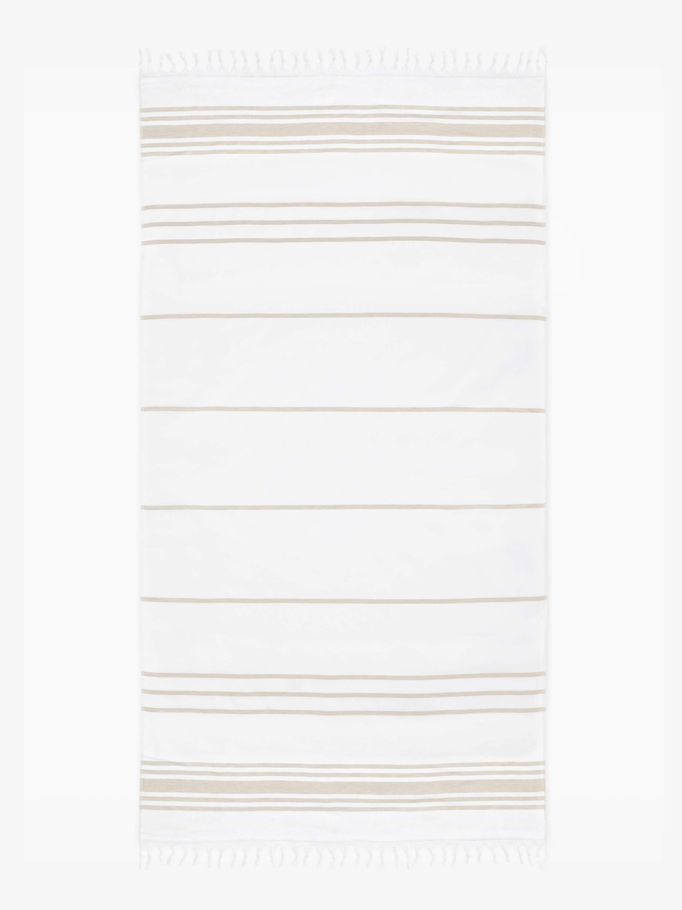White rug with thin brown stripes on a white background