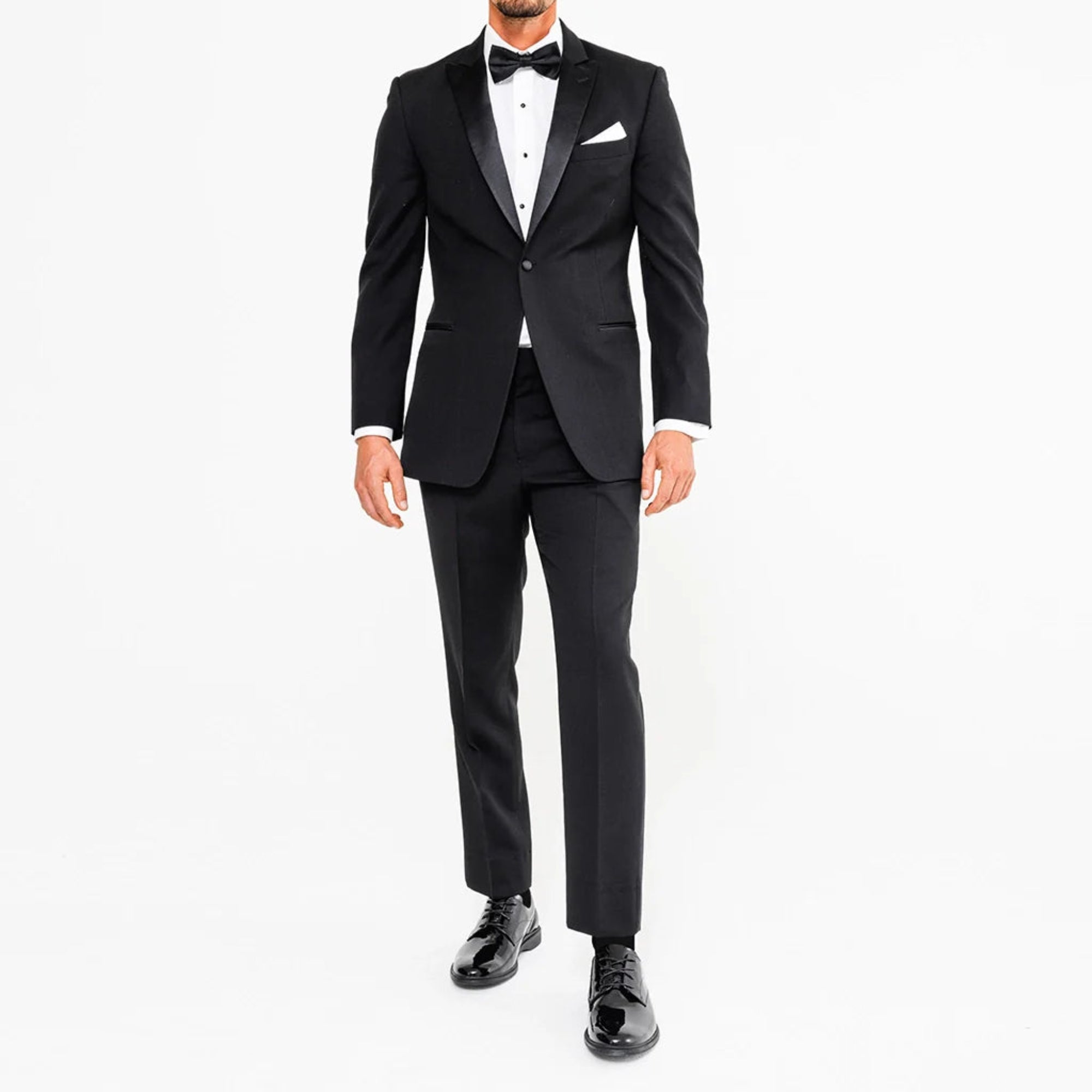 Black tuxedo with white shirt and bow tie on a white background