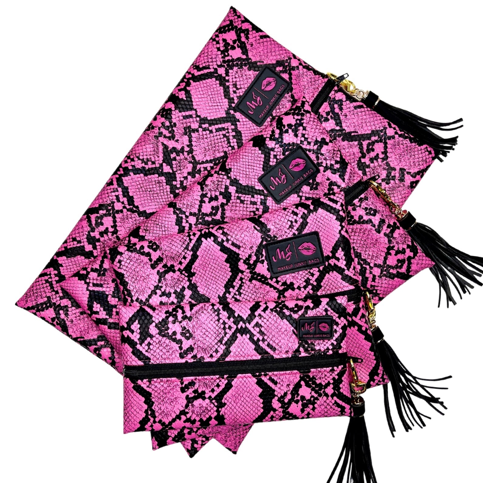 Pink and black patterned clutch bag with tassel on a white background