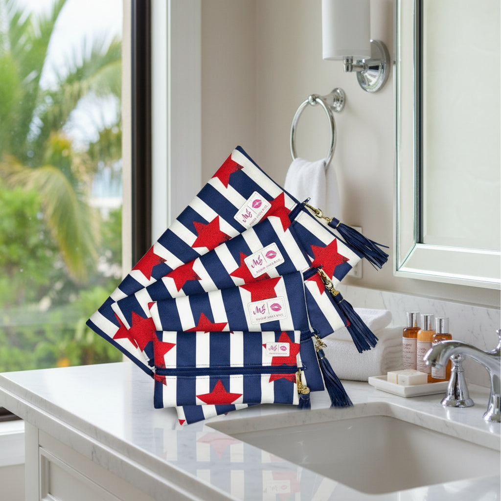 Set of makeup bags with red star pattern on a white background