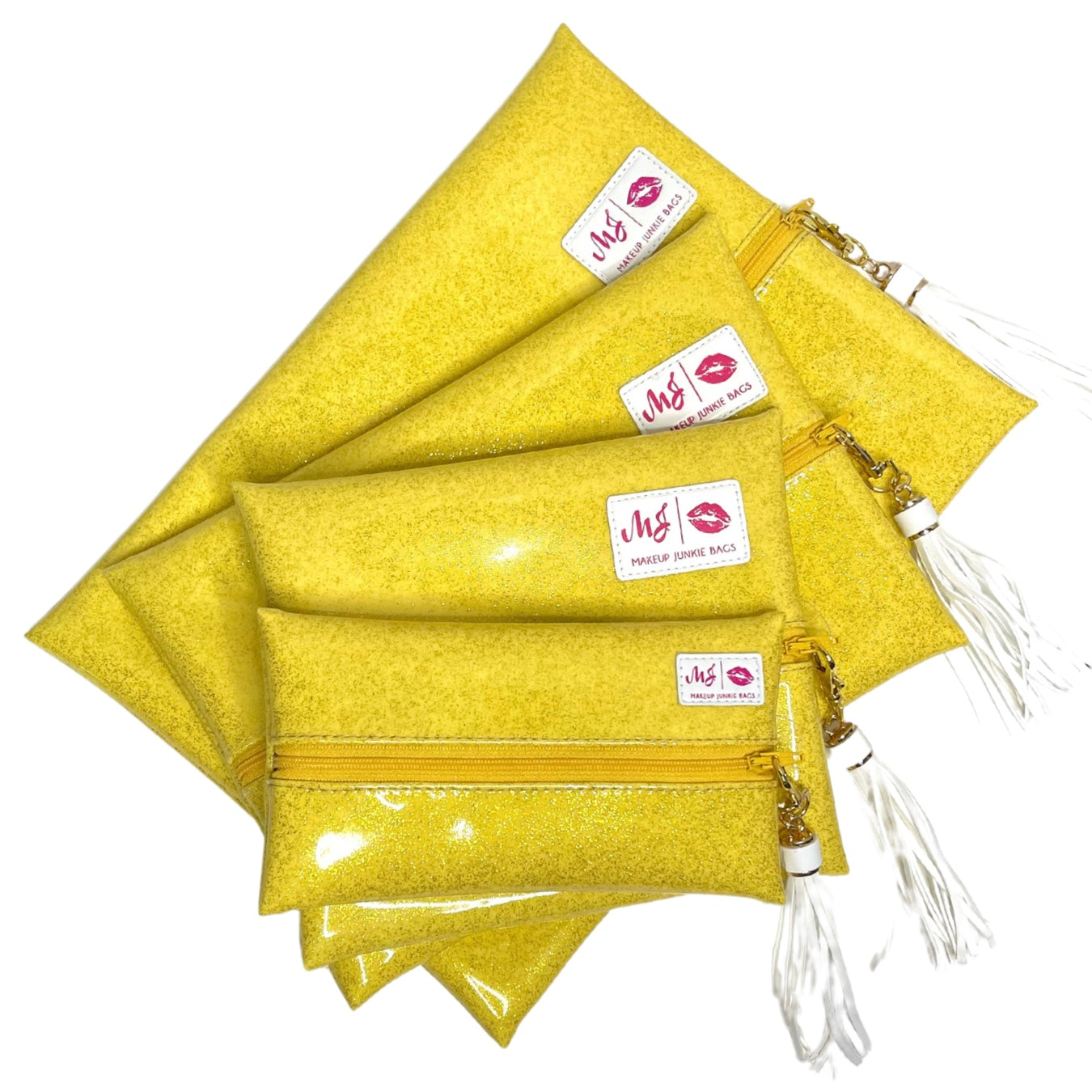 Set of yellow bags with visible brand labels on a white background