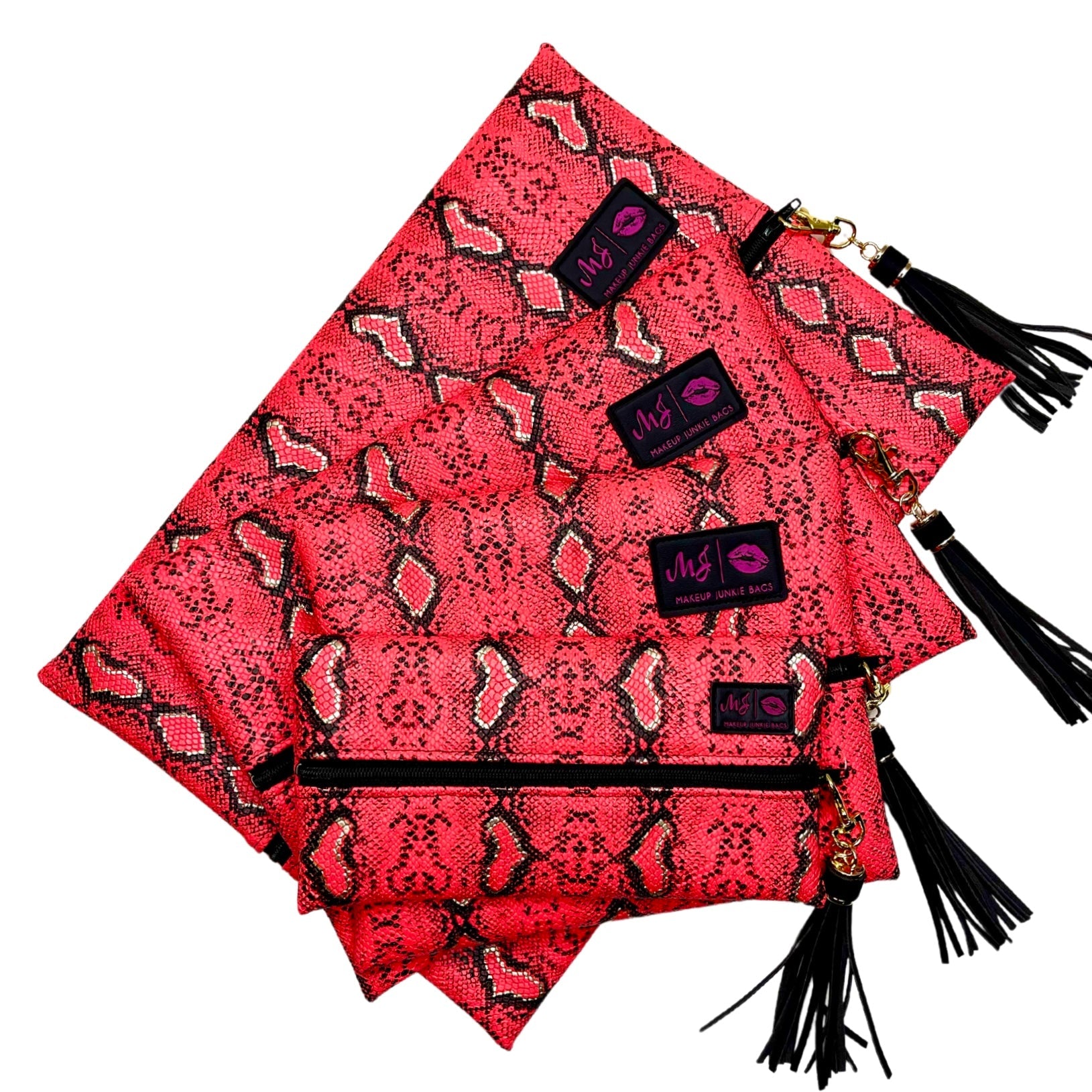 Red patterned clutch bag with black tassels and visible brand label on a white background