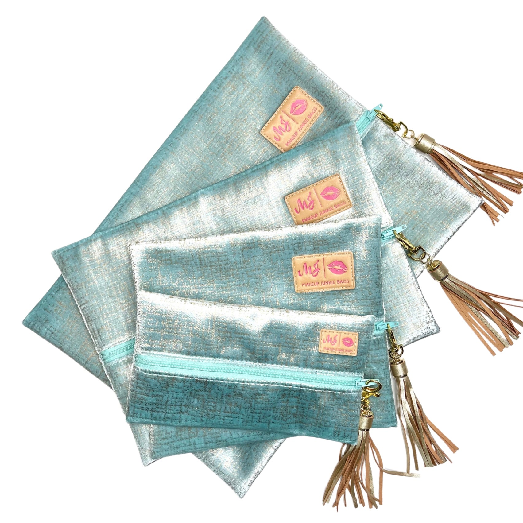 Set of blue pouches with tassels and visible brand label on a white background