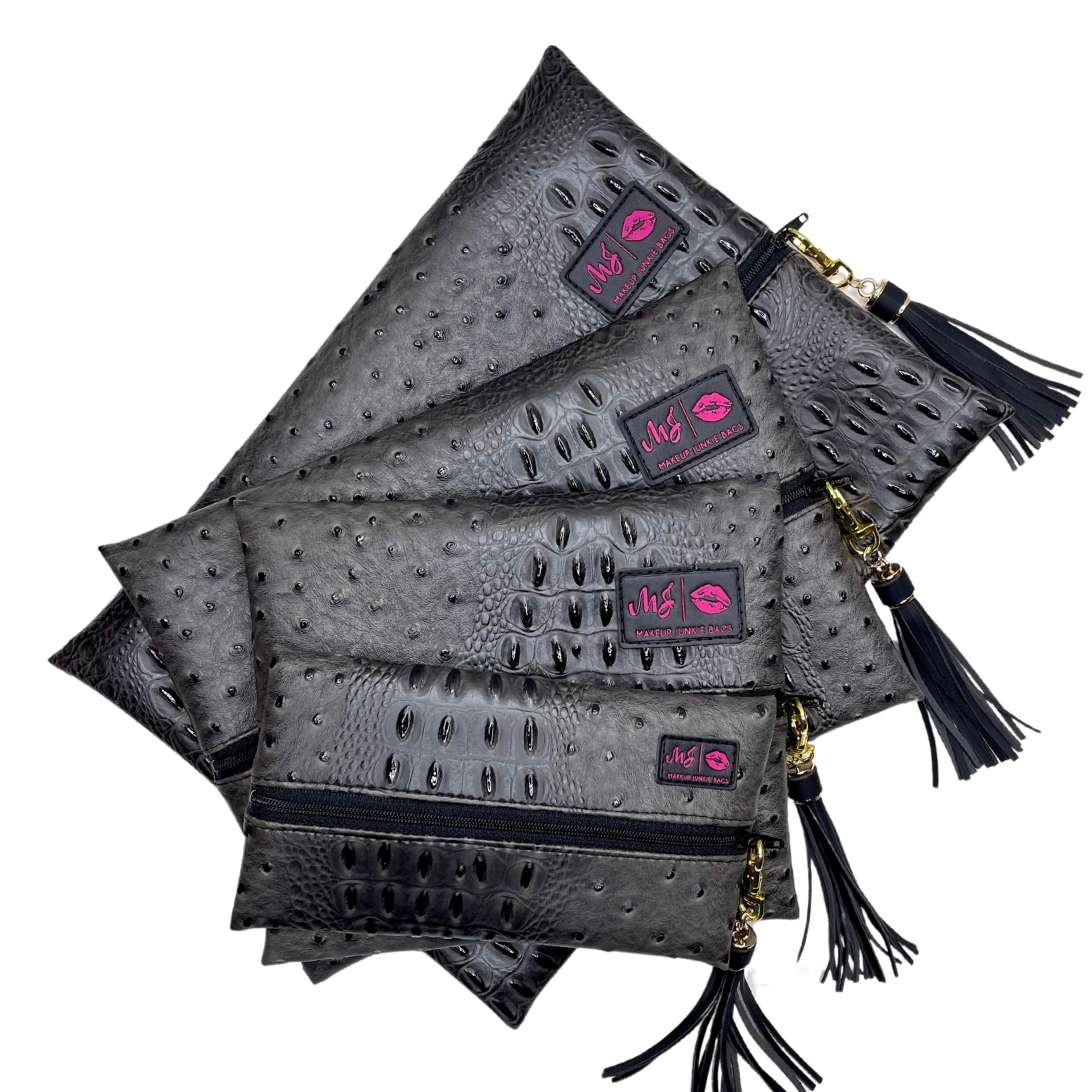 Set of gray clutch bags with black tassels and pink logo on a white background