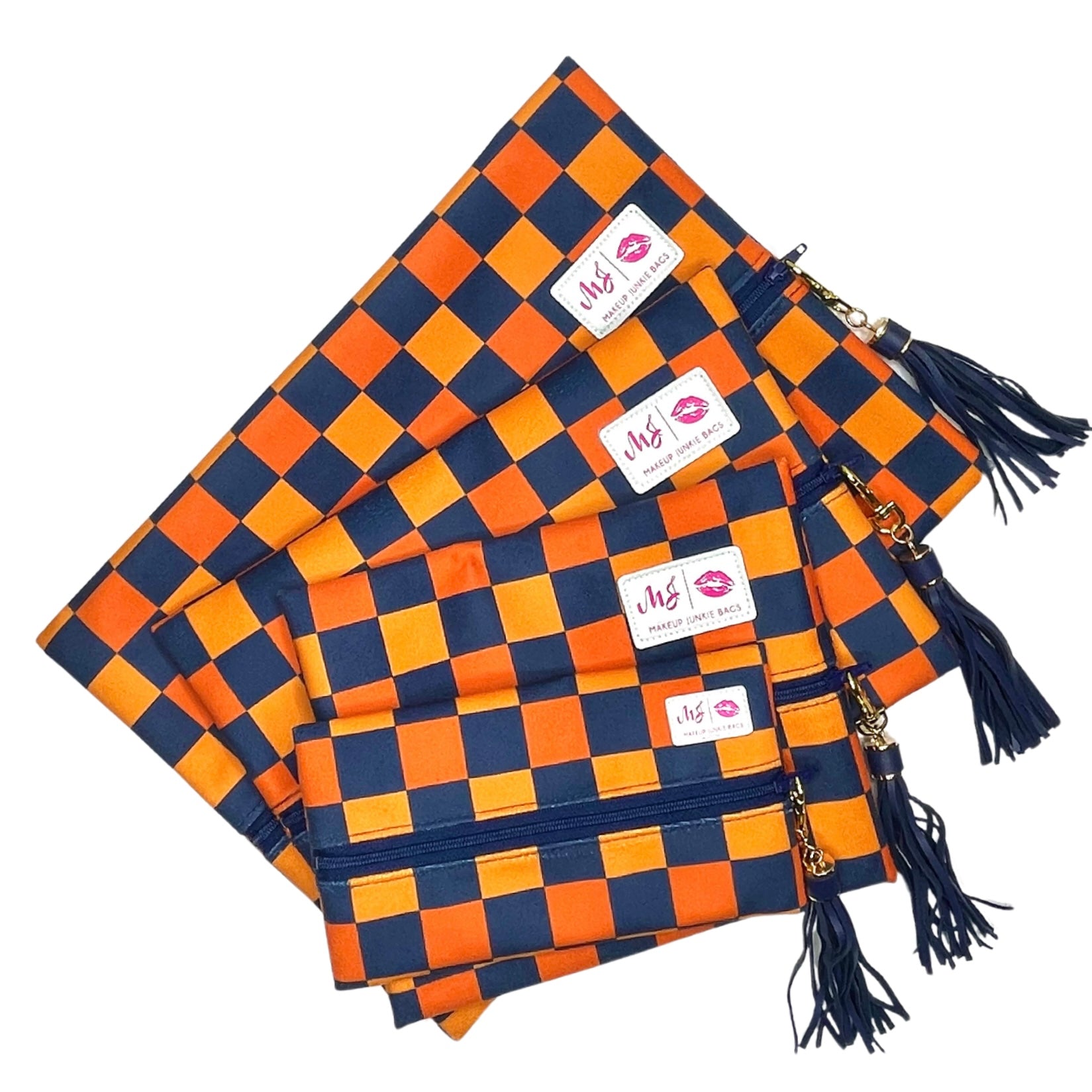 Set of orange and blue checkered bags with tassels on a white background