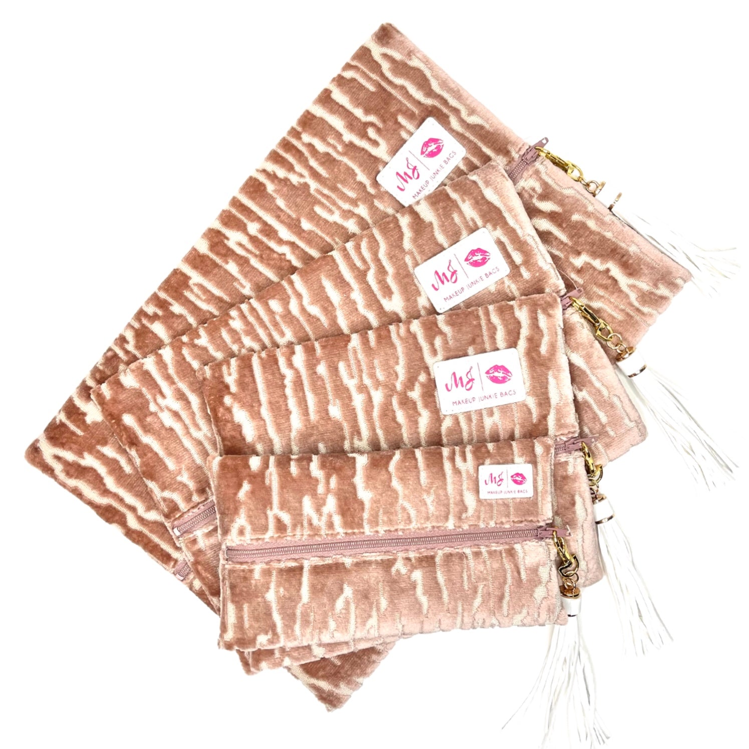 Set of pink zebra patterned pouches with visible brand labels on a white background