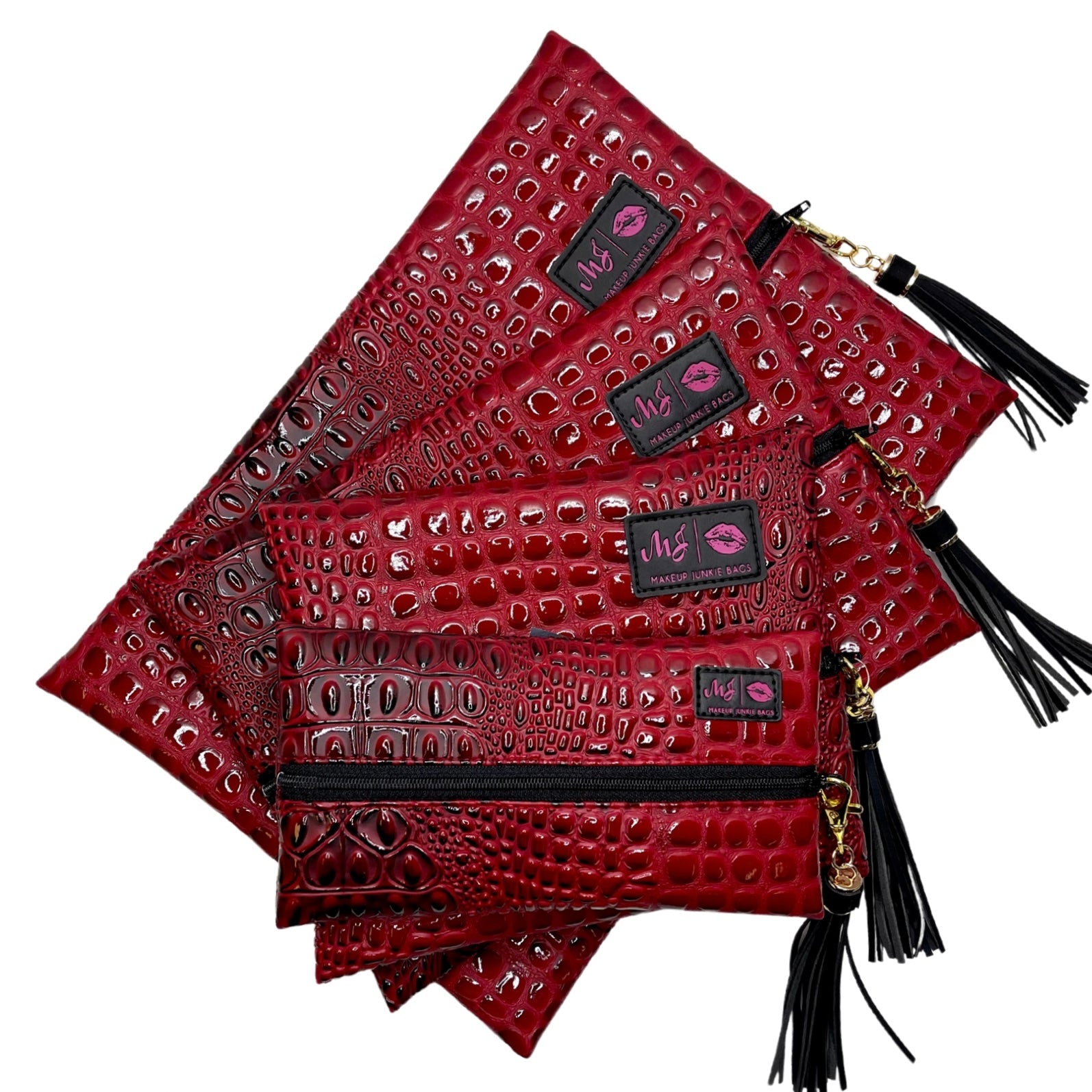 Red textured handbags with black tassels and visible brand labels on a white background
