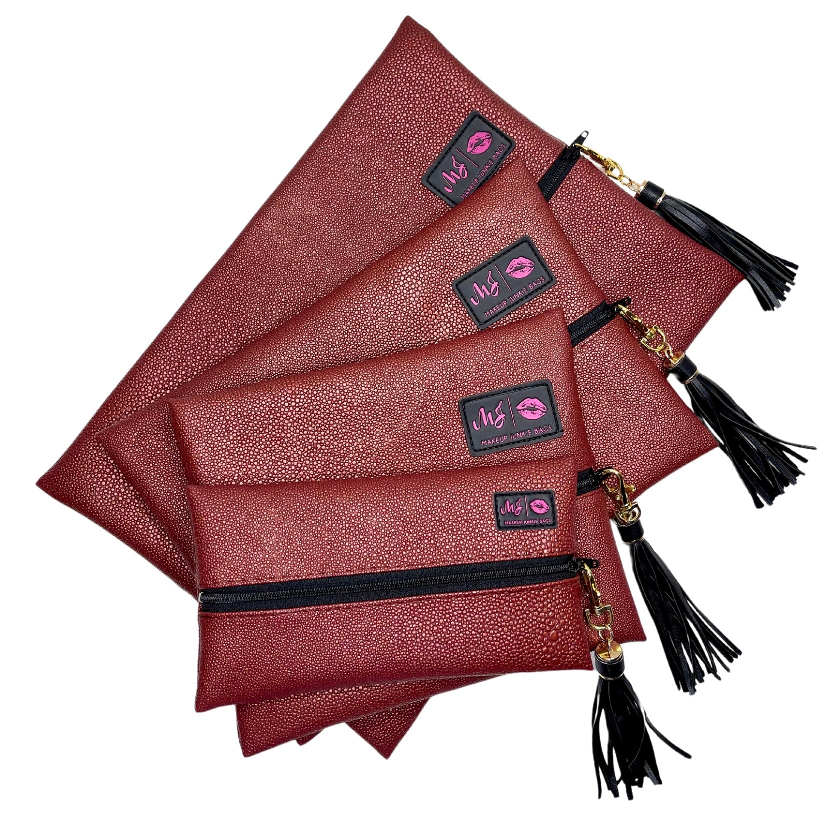 Set of red clutch bags with tassels and visible brand logo on a white background