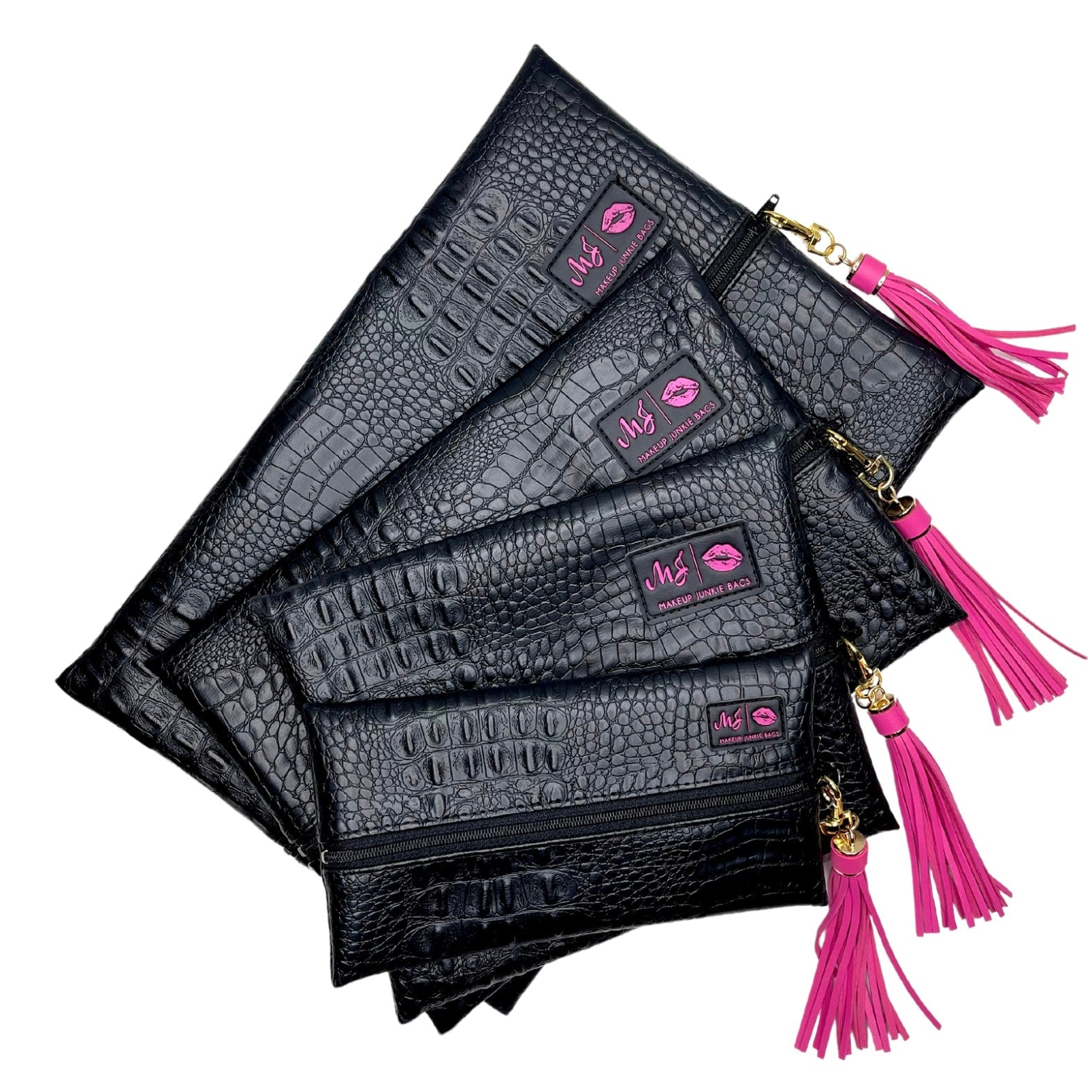 Black crocodile-patterned pouches with pink tassels and visible brand logo on a white background