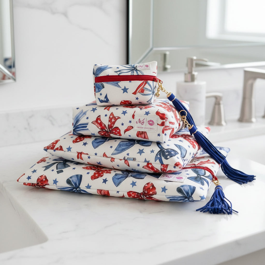 Set of pouches with red, white, and blue bow designs on a white background