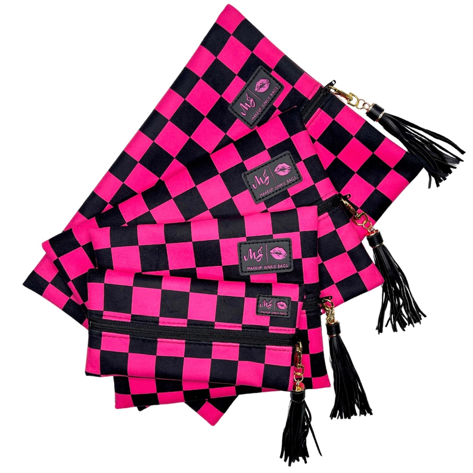 Pink and black checkered bags with tassels on a white background
