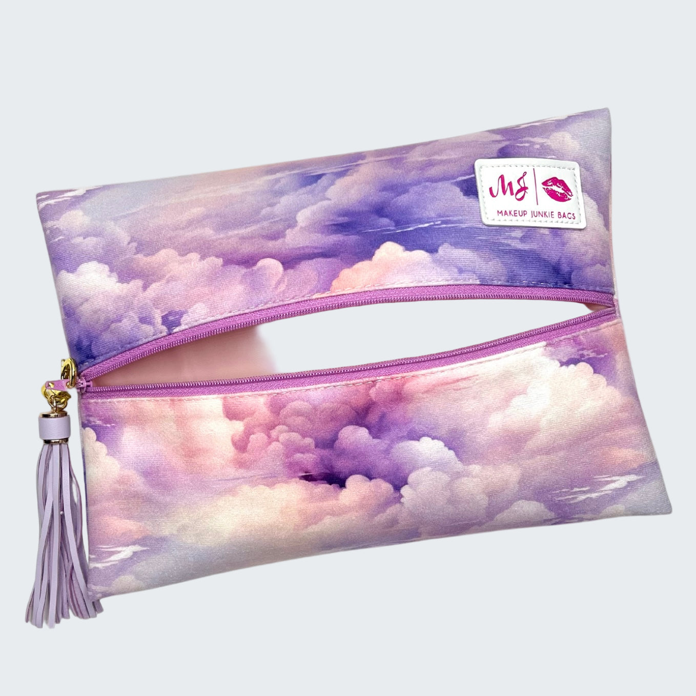 Makeup bag with cloud pattern and visible brand logo on a white background