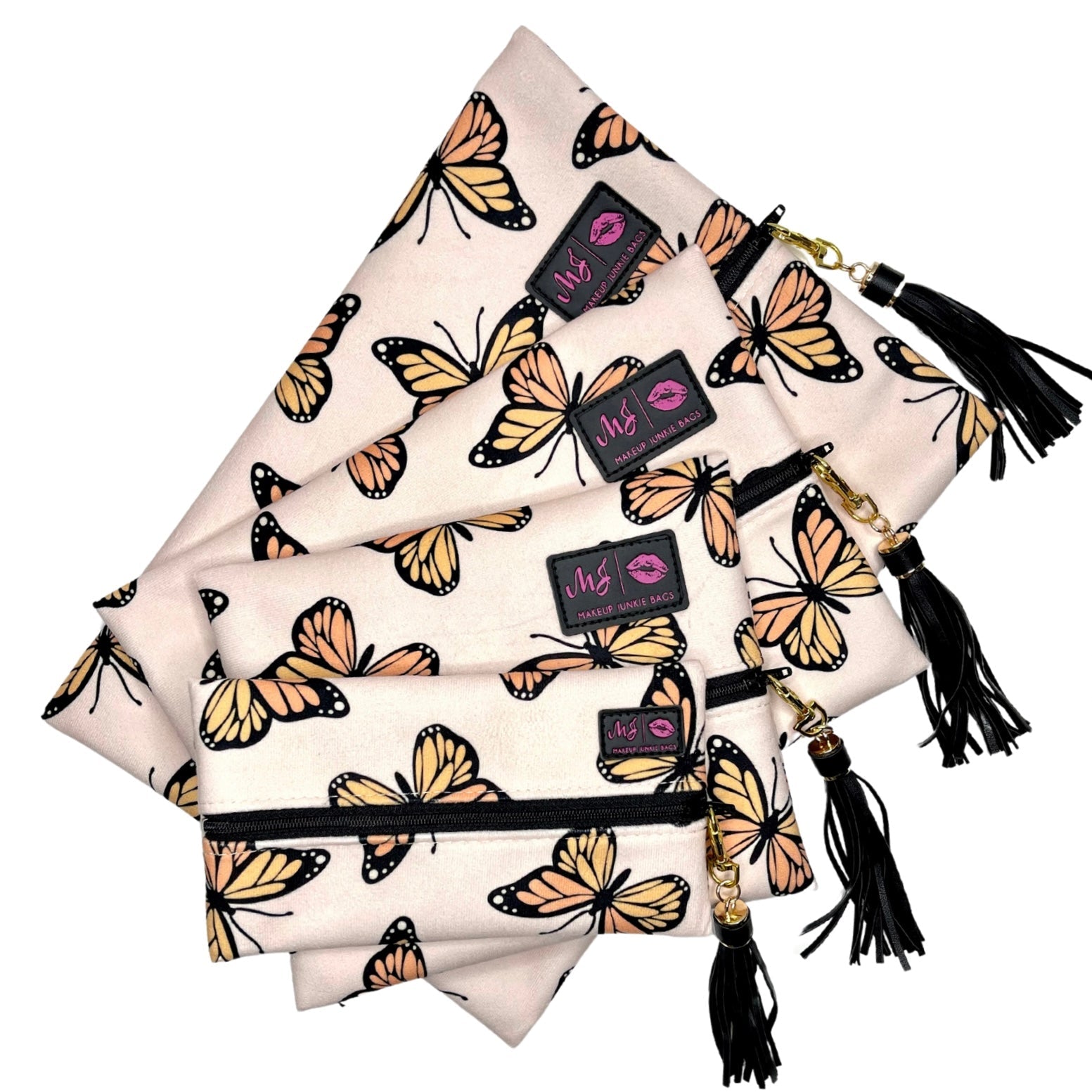 Butterfly-patterned bags with black tassels and branded cards on a white background