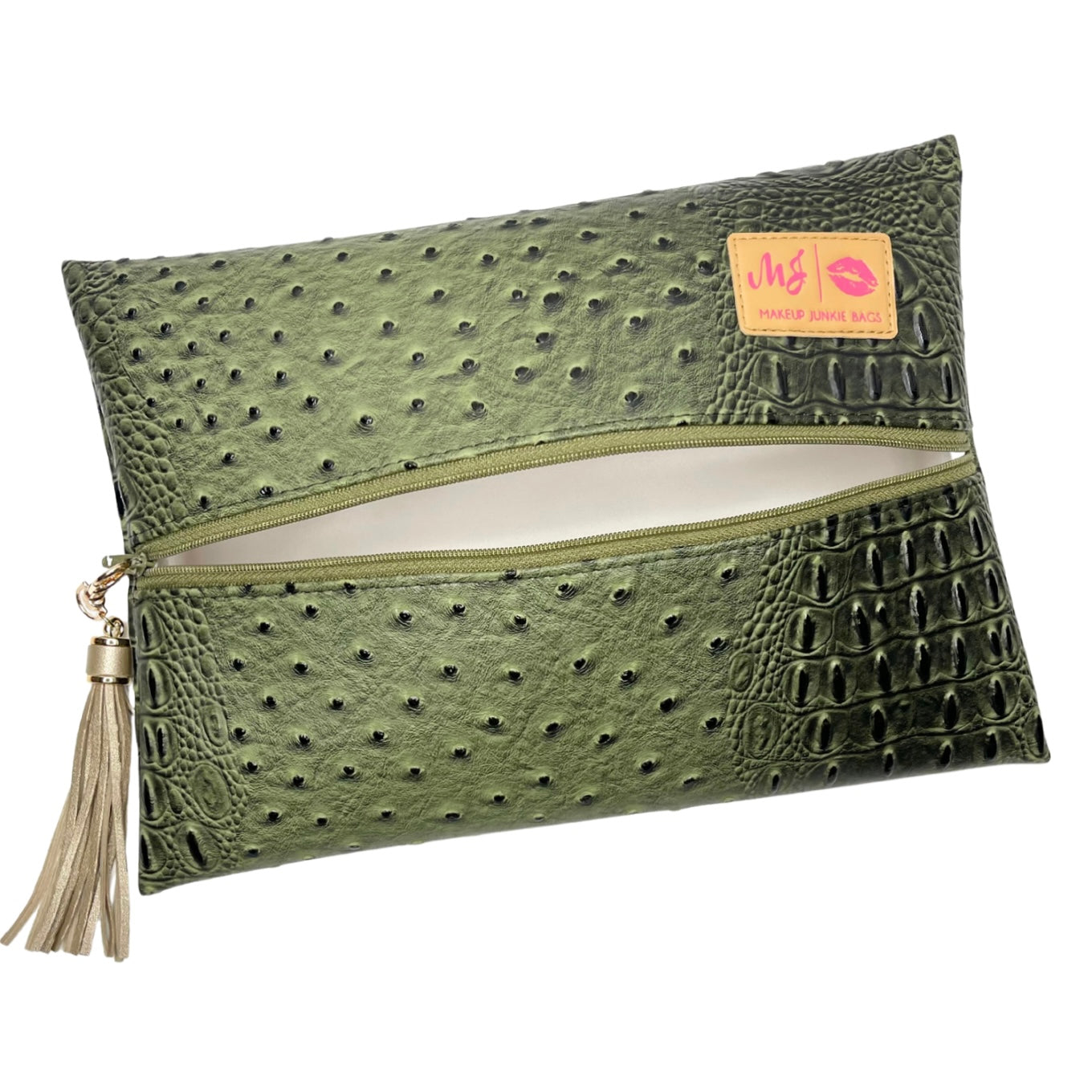 Green textured clutch bag with a tassel on a white background