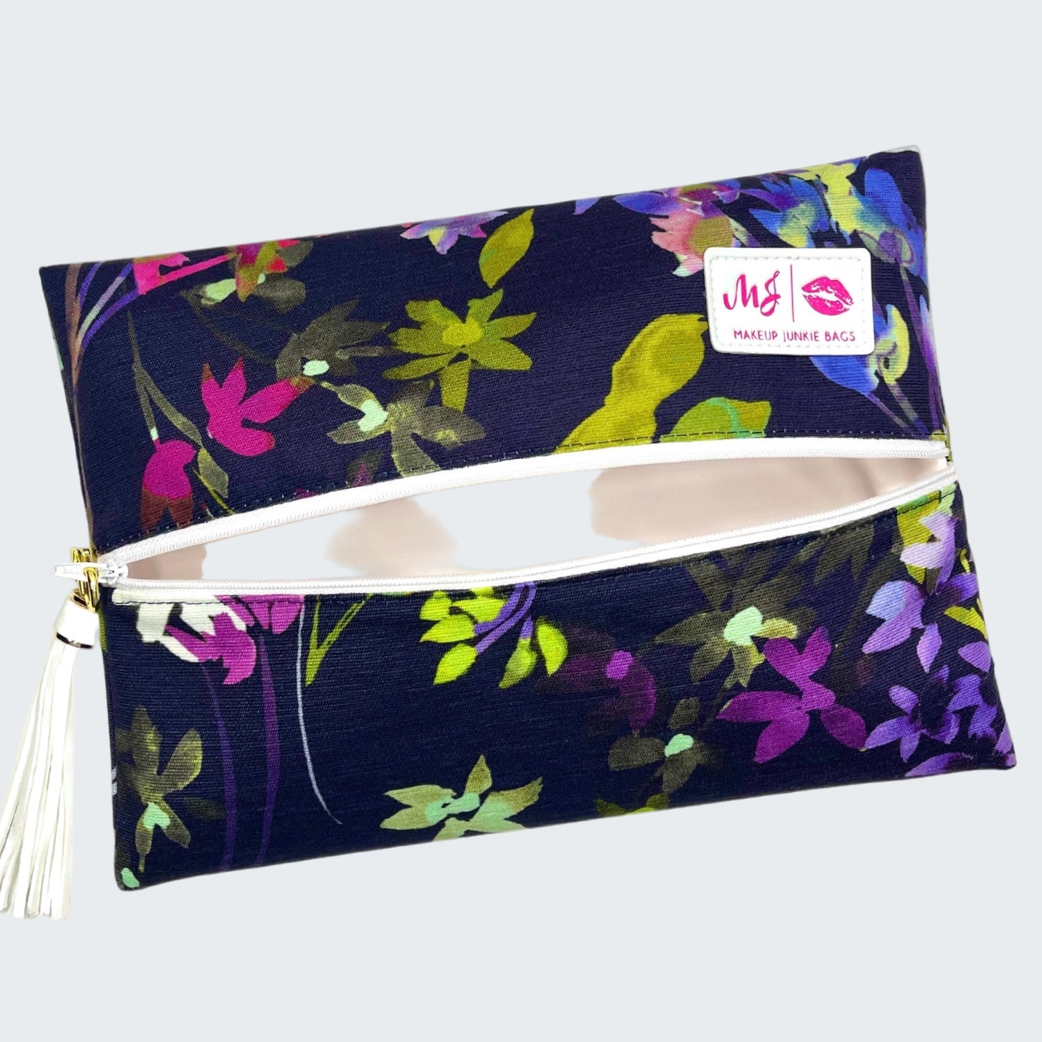 Floral-patterned makeup bag with a visible brand logo on a white background